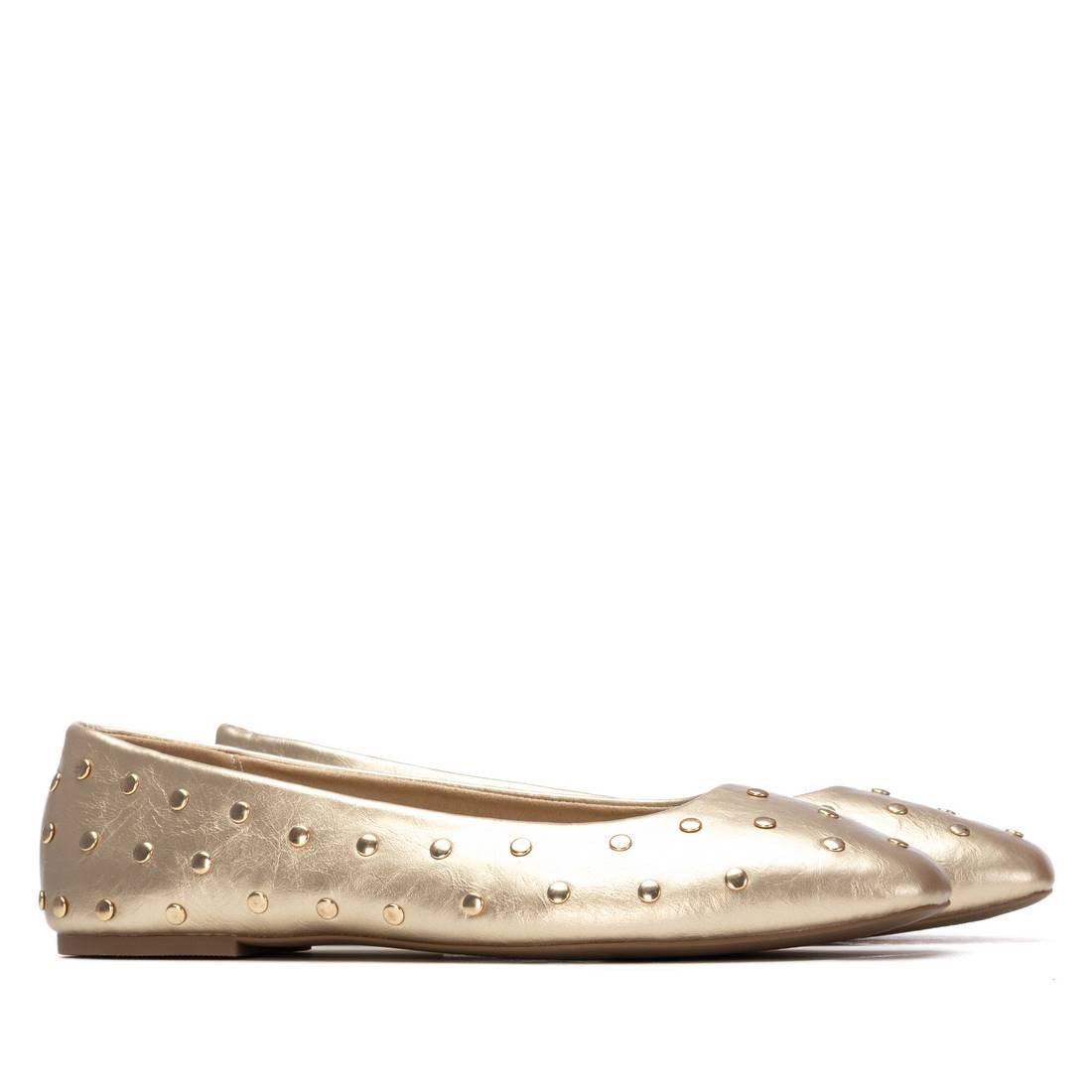 A pair of gold studded summer pumps
