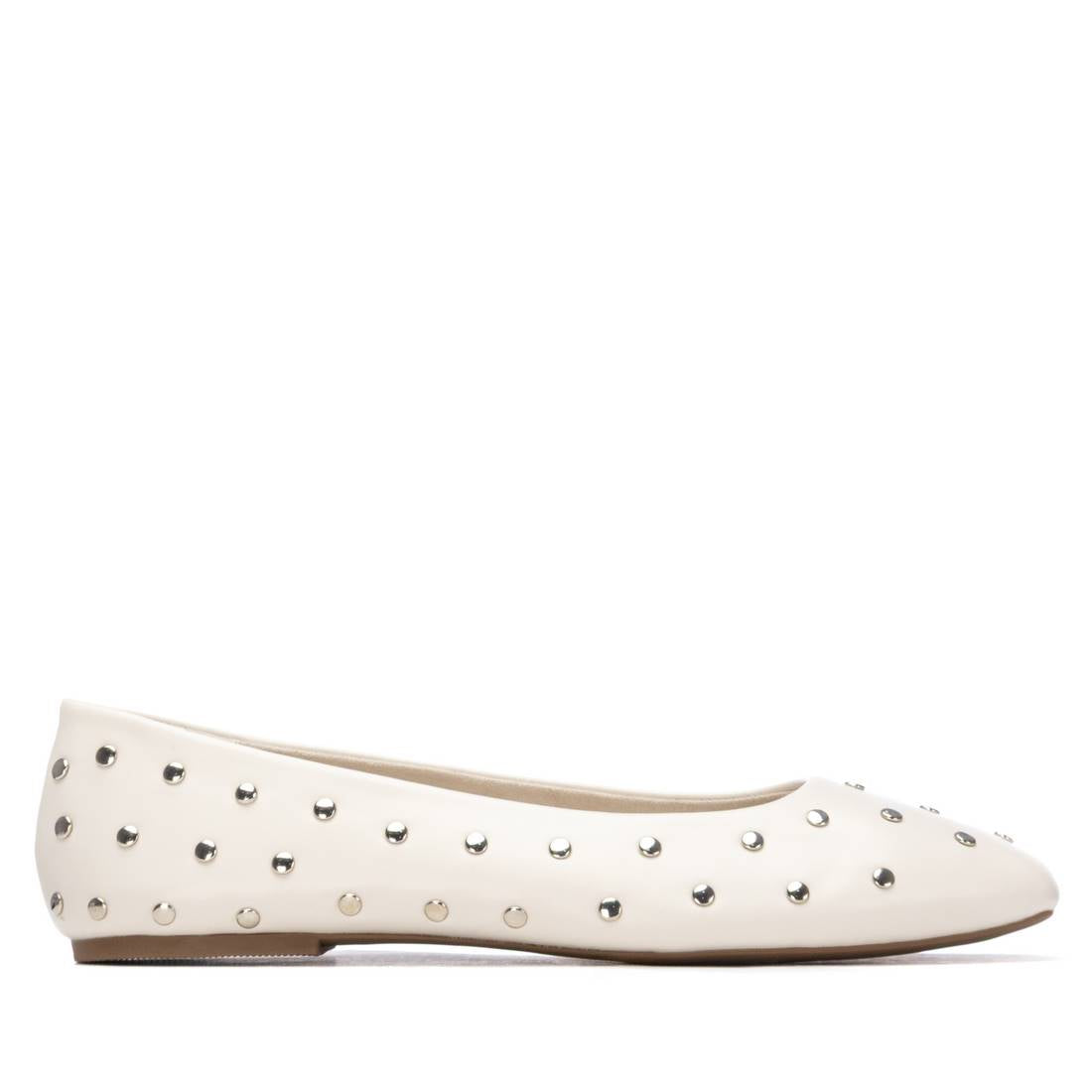 White flat shoe with decorative studs