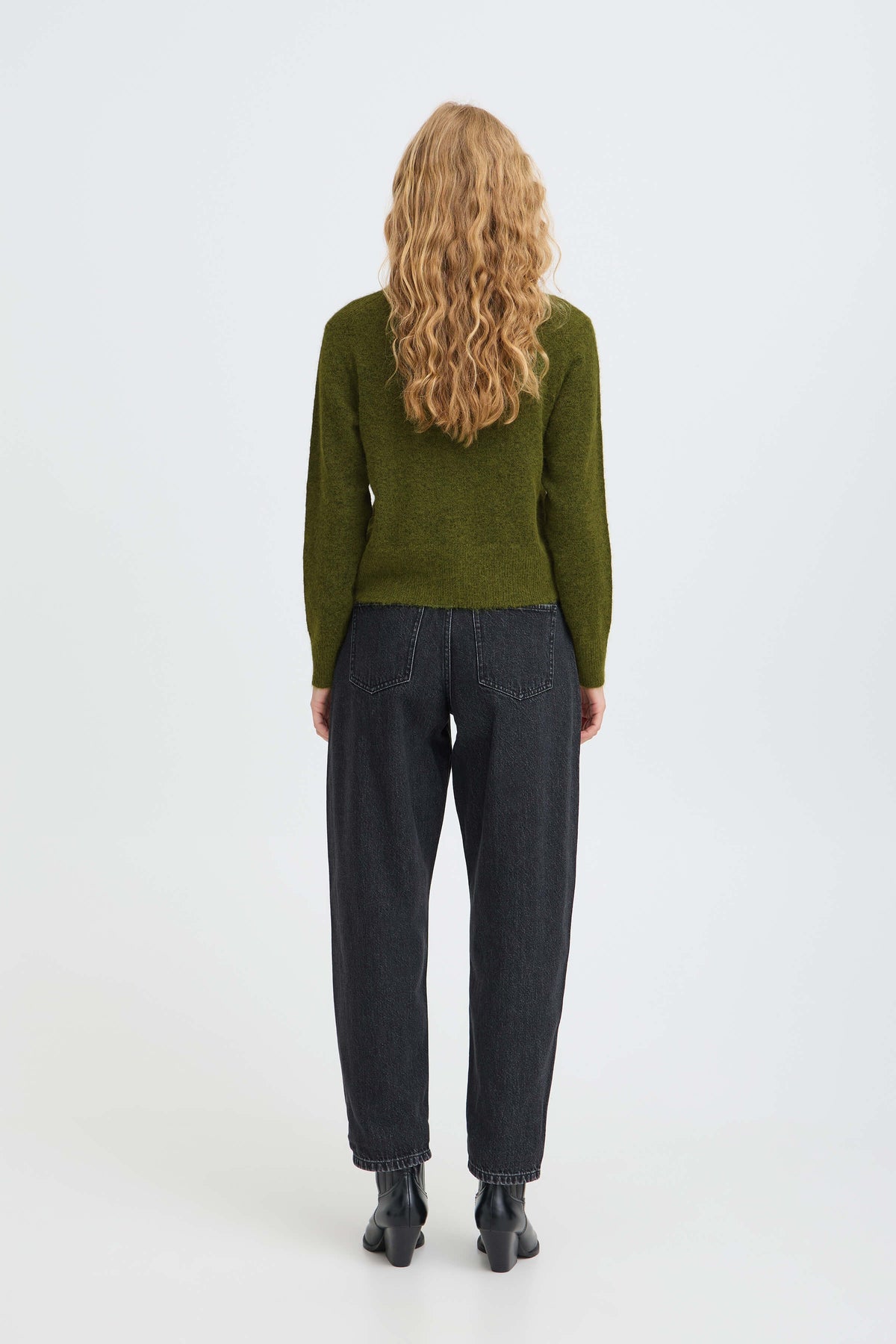 Back view of the b.young Minua olive green cardigan styled with black jeans