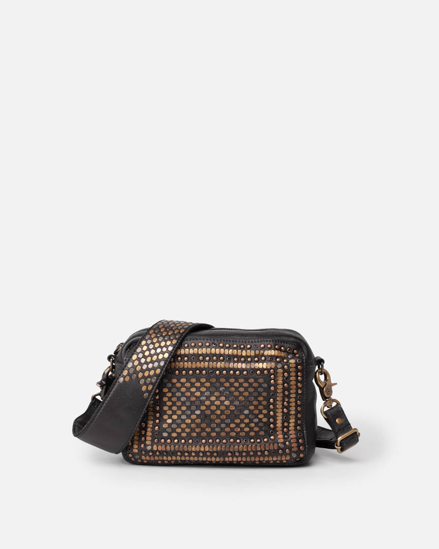 A small black leather crossbody bag featuring a geometric pattern of brown and gold studs on the front panel, with a black leather strap and gold-tone hardware from BIBA