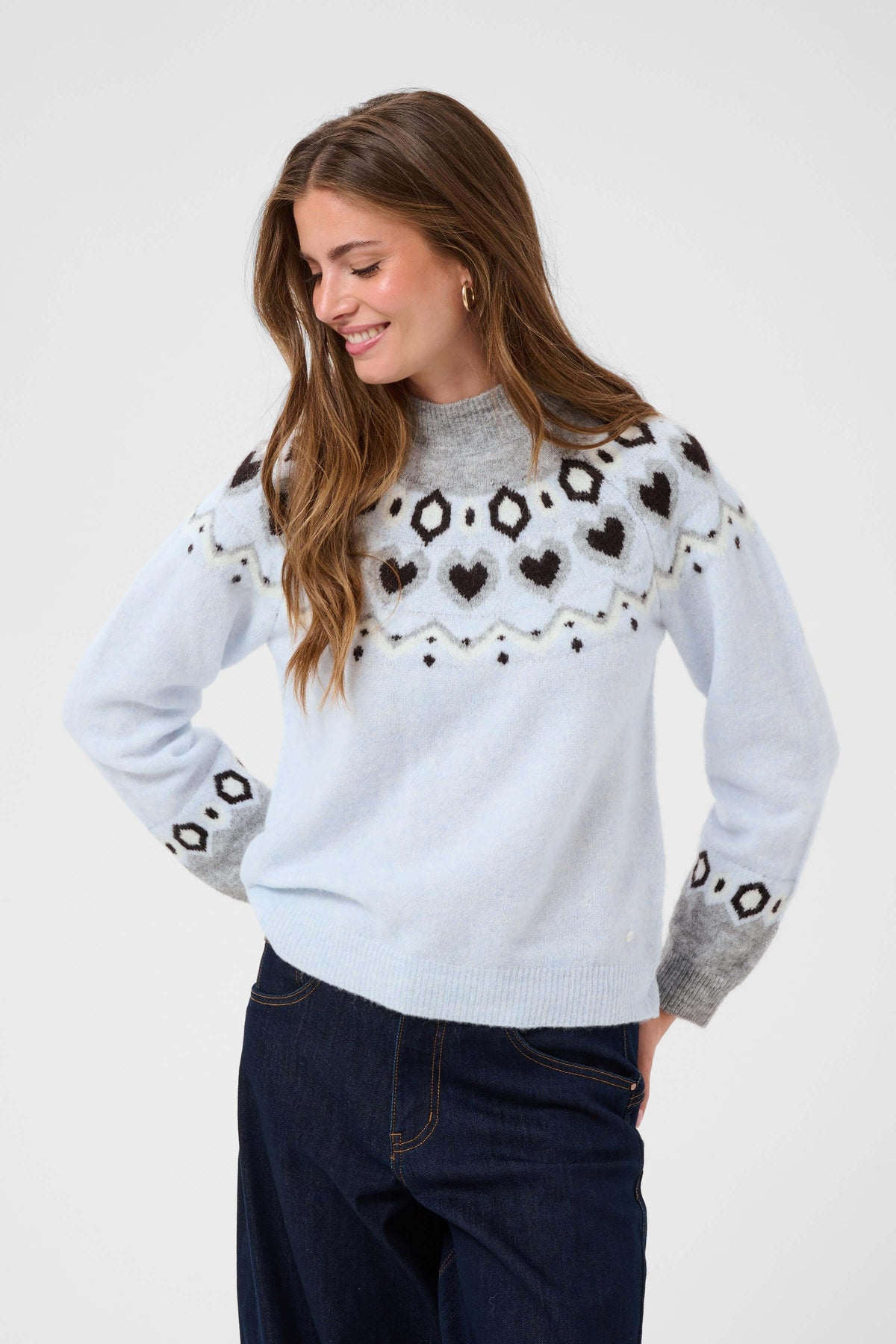 Cream Cherrie hip-length jacquard jumper styled on model