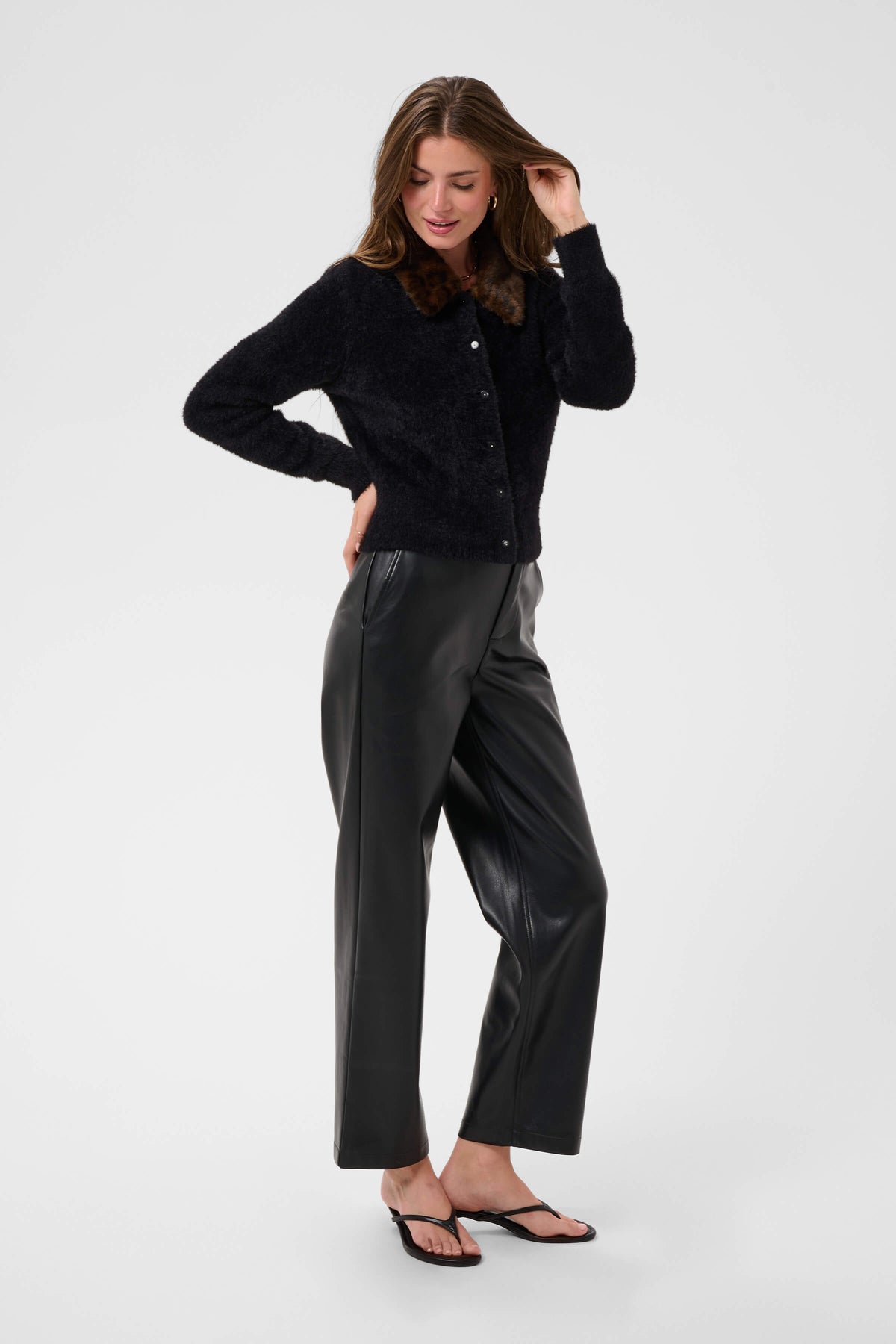 Black women’s cardigan with faux-fur-style collar