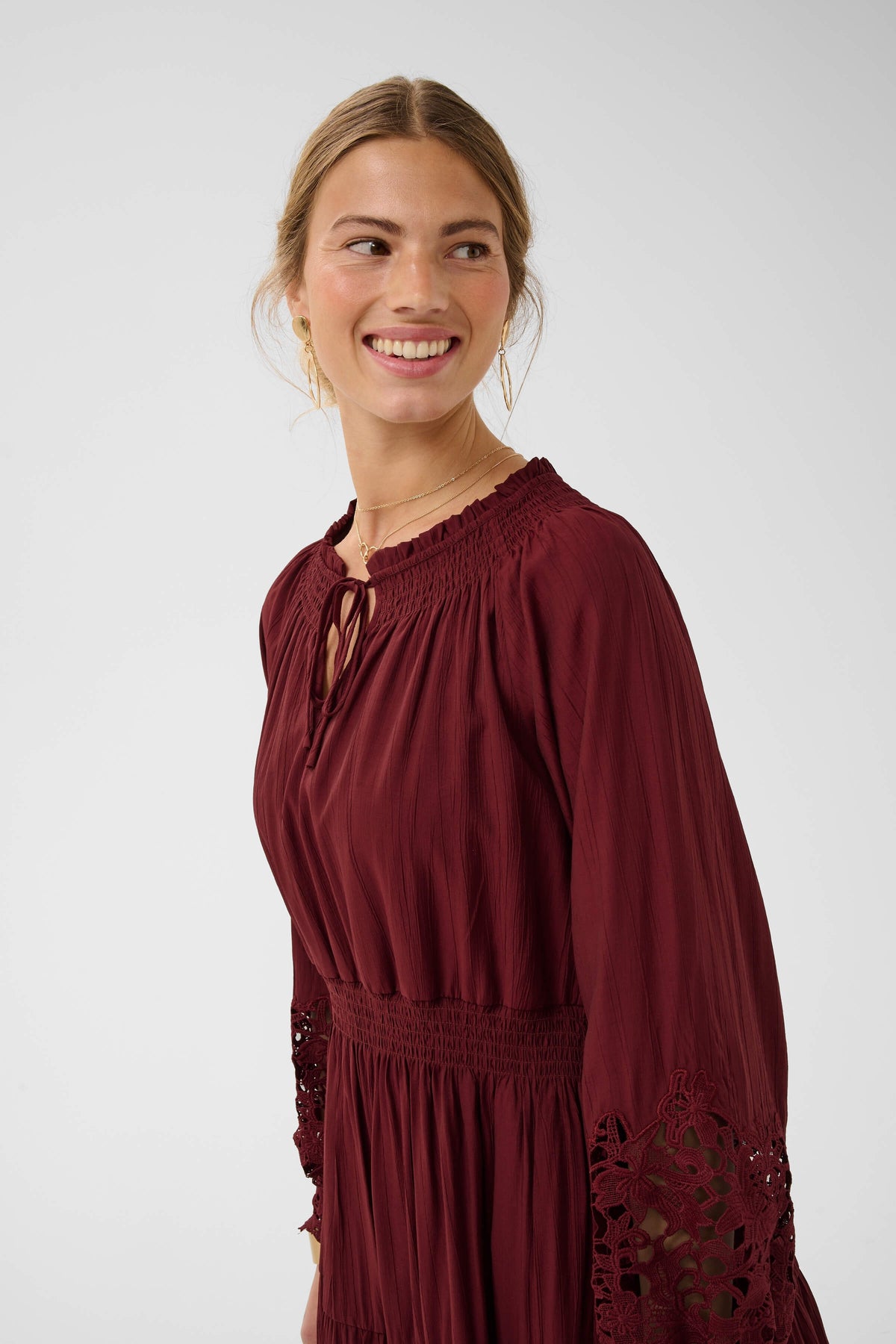 Cream Tina embroidered long-sleeve dress on model