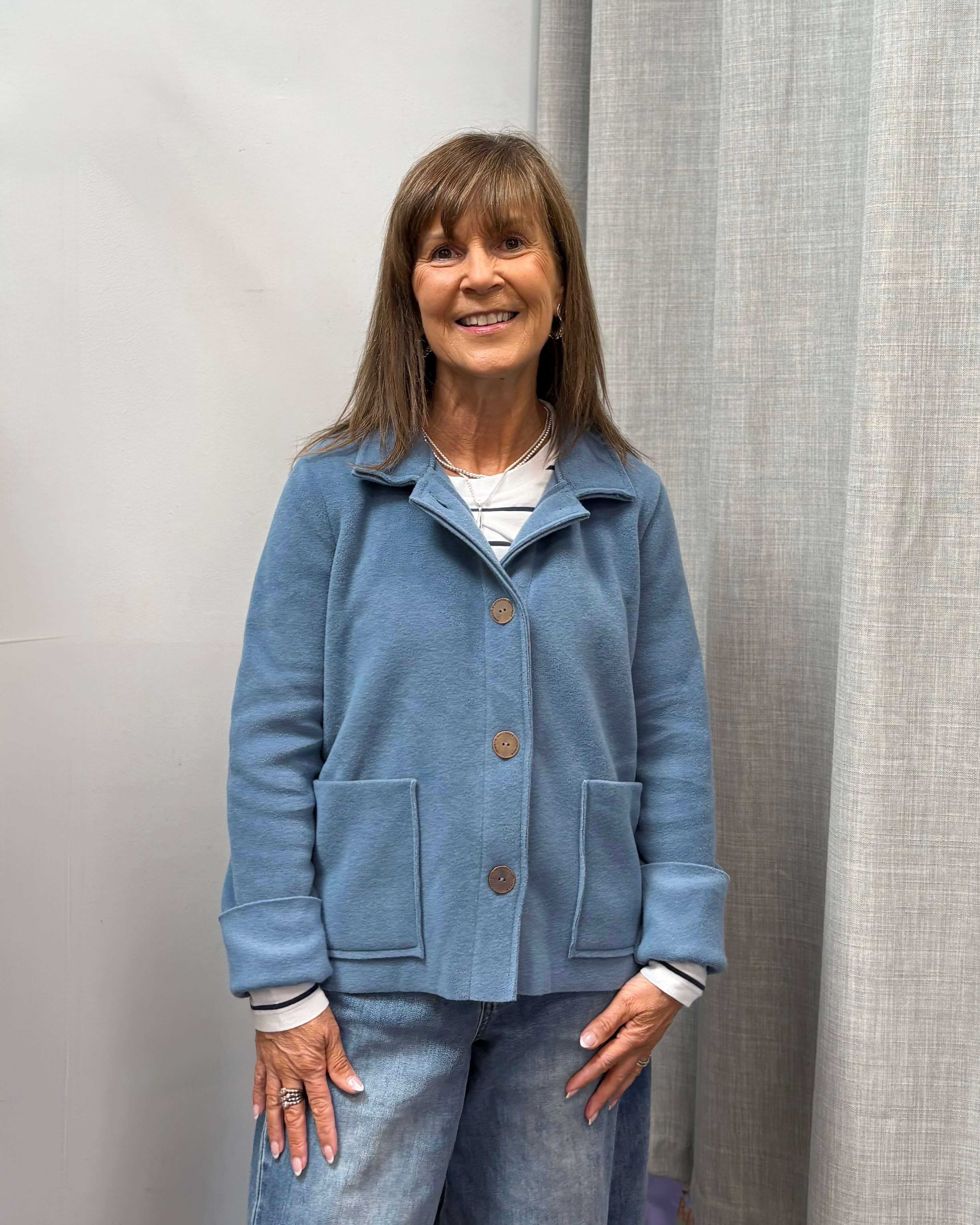 Henriette Steffenset Copenhagen short jacket in dusty blue buttoned up