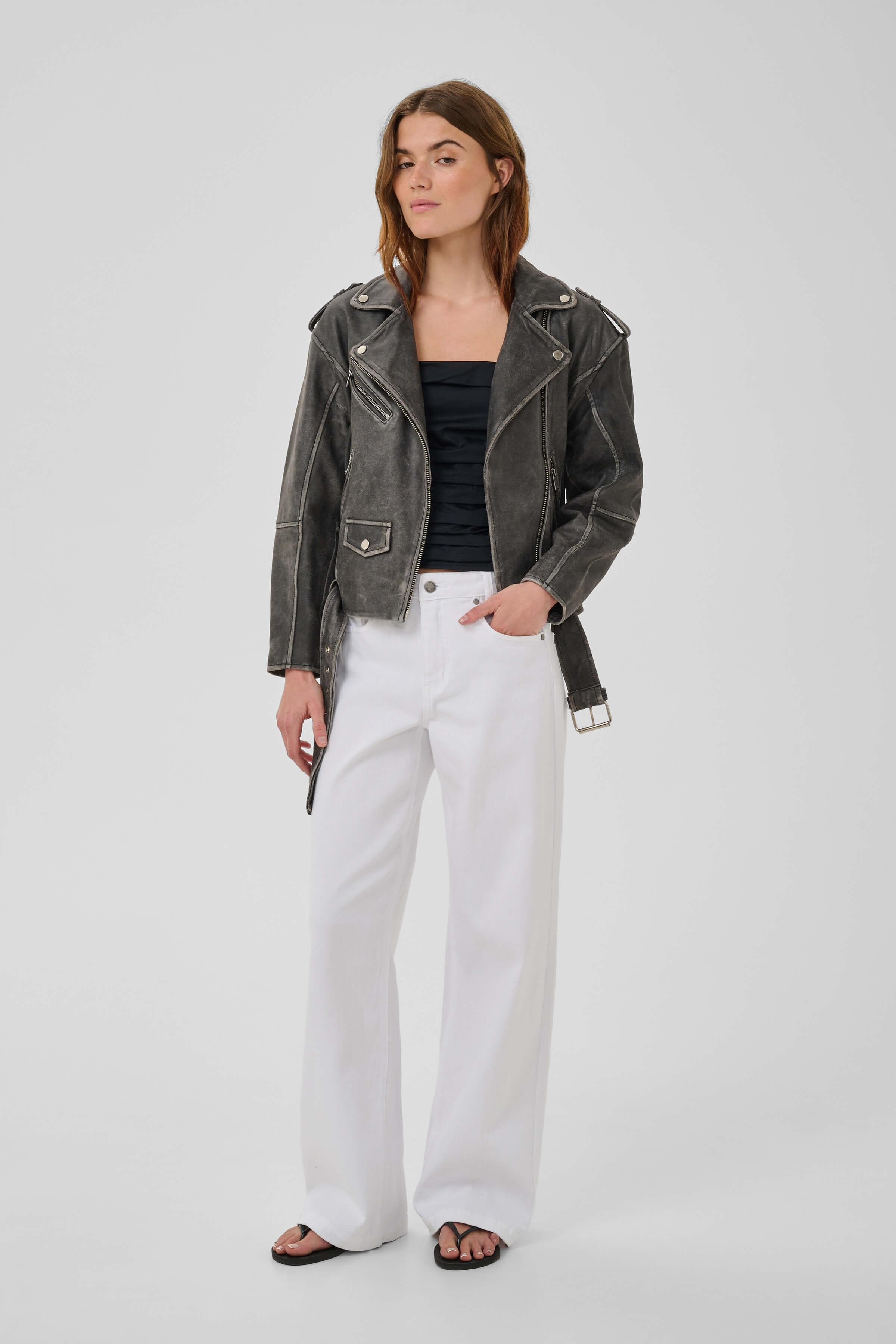 Gilo leather jacket with zipped pockets and waist belt