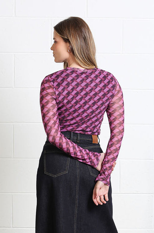 Front view of the Alanna Top featuring a round neckline and long sleeves
