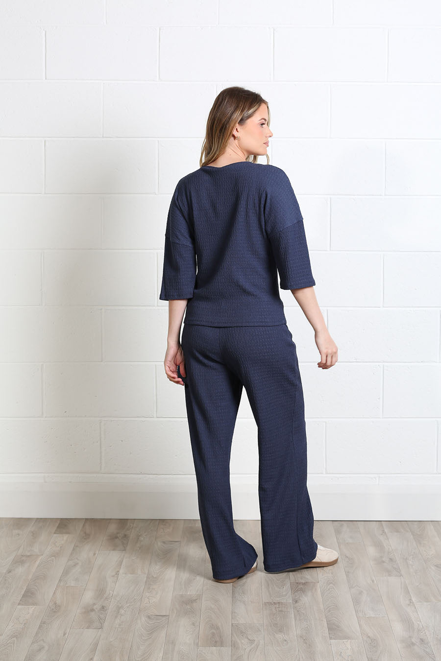 Front view of the Freya round-neck top with three-quarter sleeves