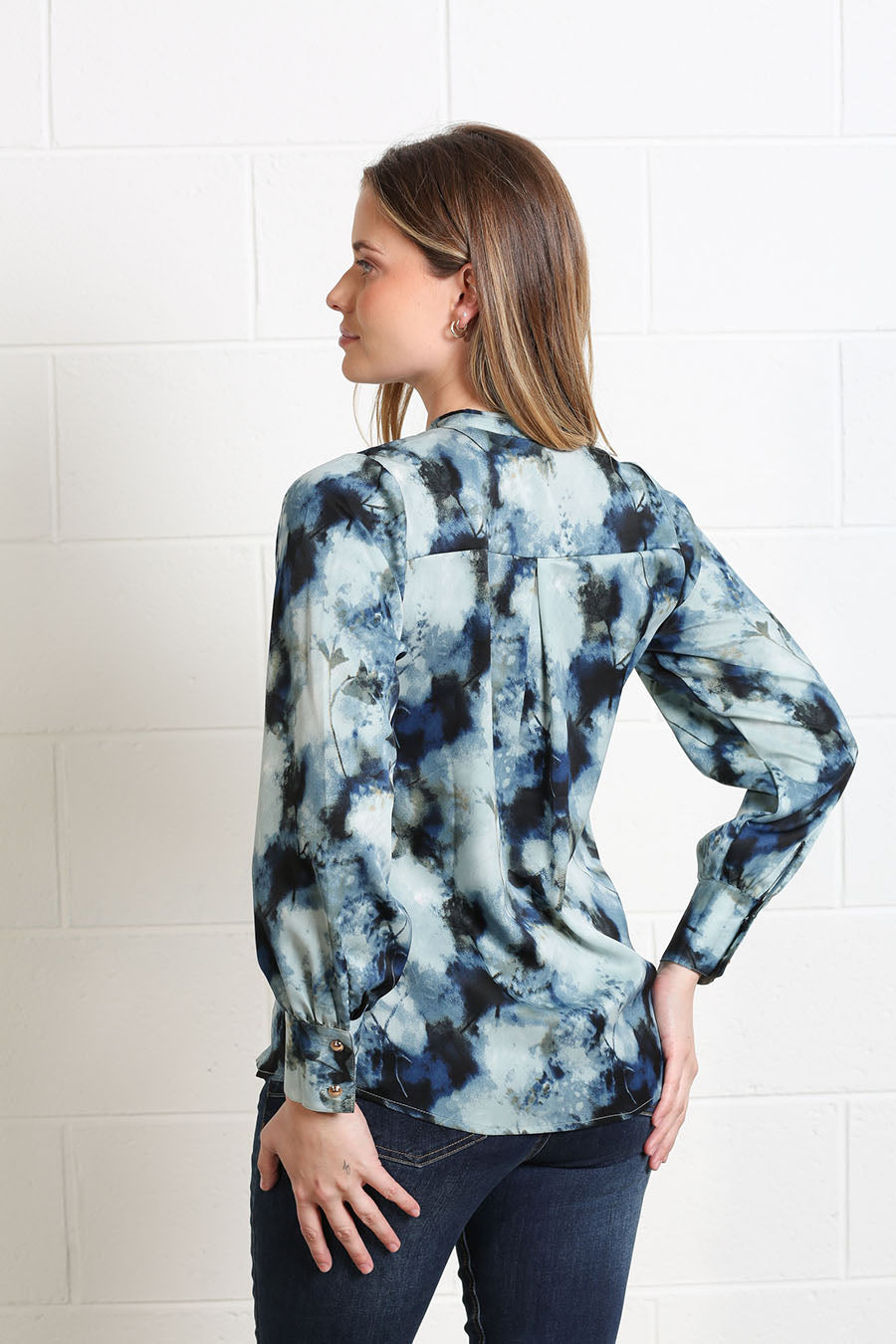 Model wearing the Rant & Rave Leah Top with fitted jeans