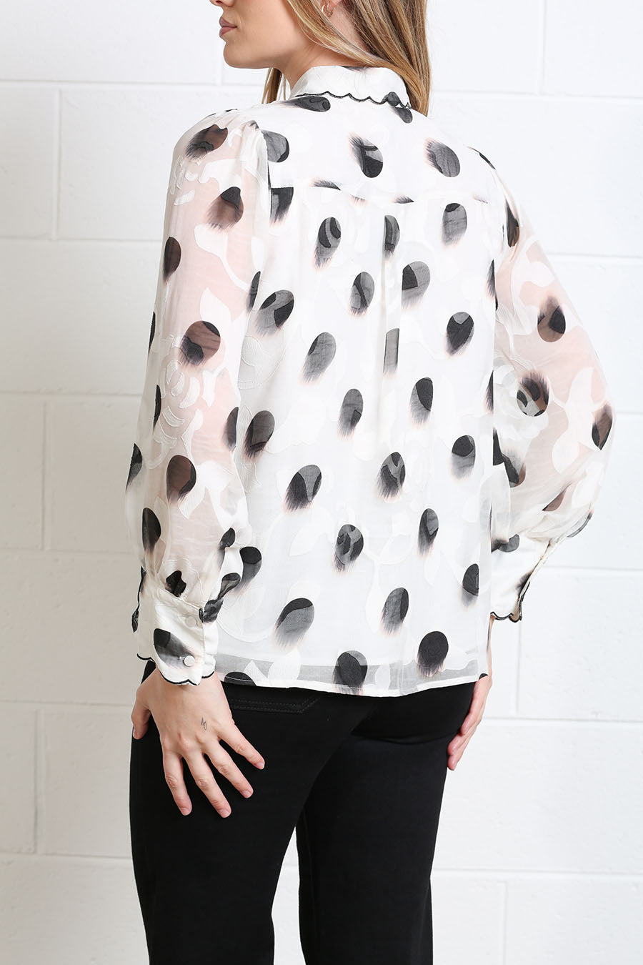 Side view of the Posy Blouse showing its relaxed blouson silhouette