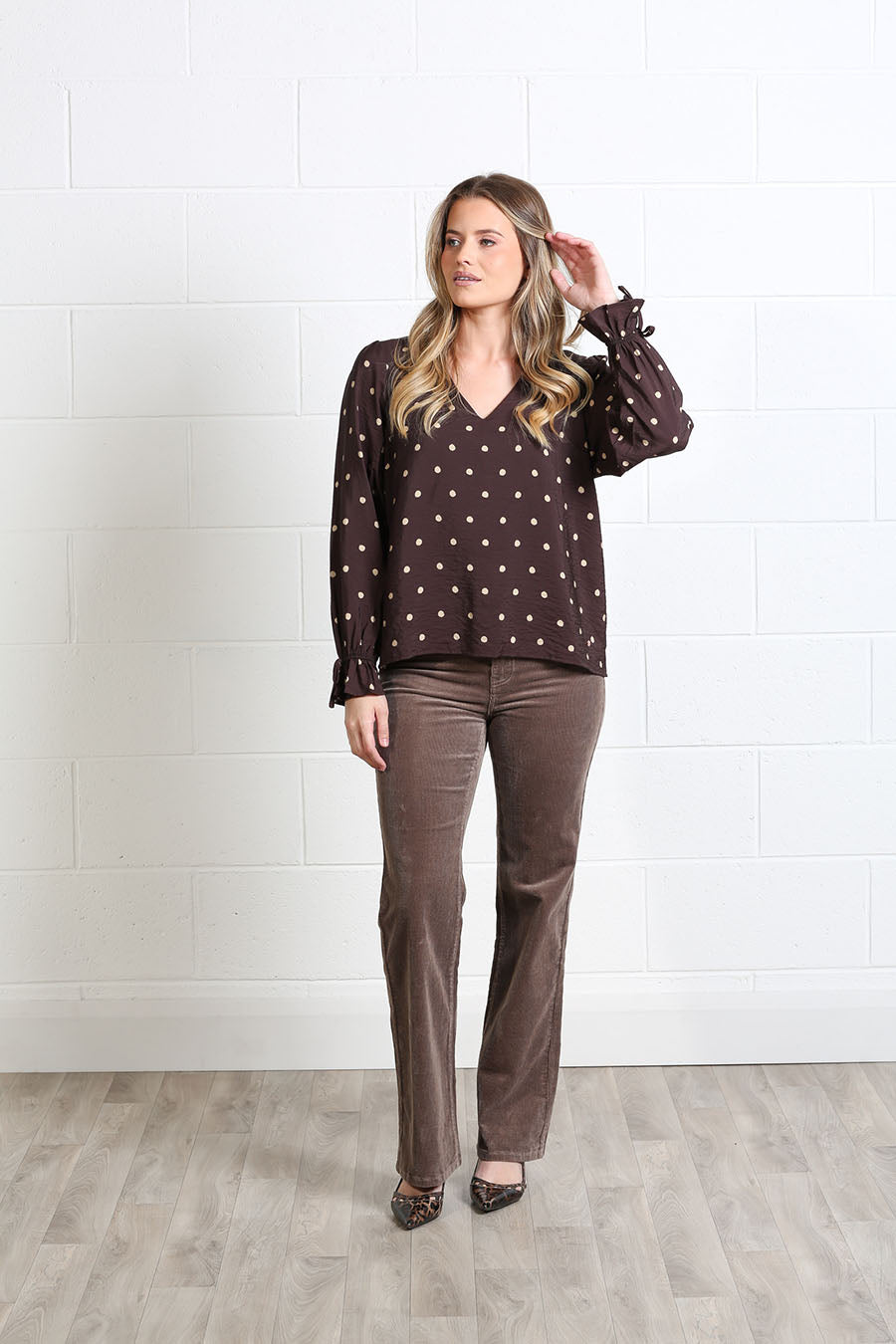 Model wearing the Rant & Rave Sophia printed top with trousers