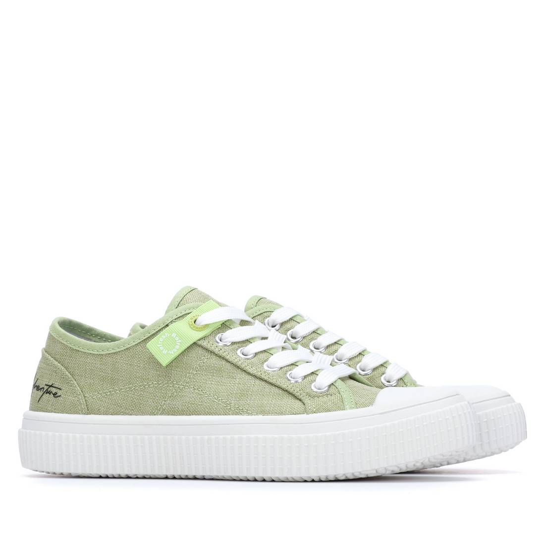 Green sneaker with white laces and toe