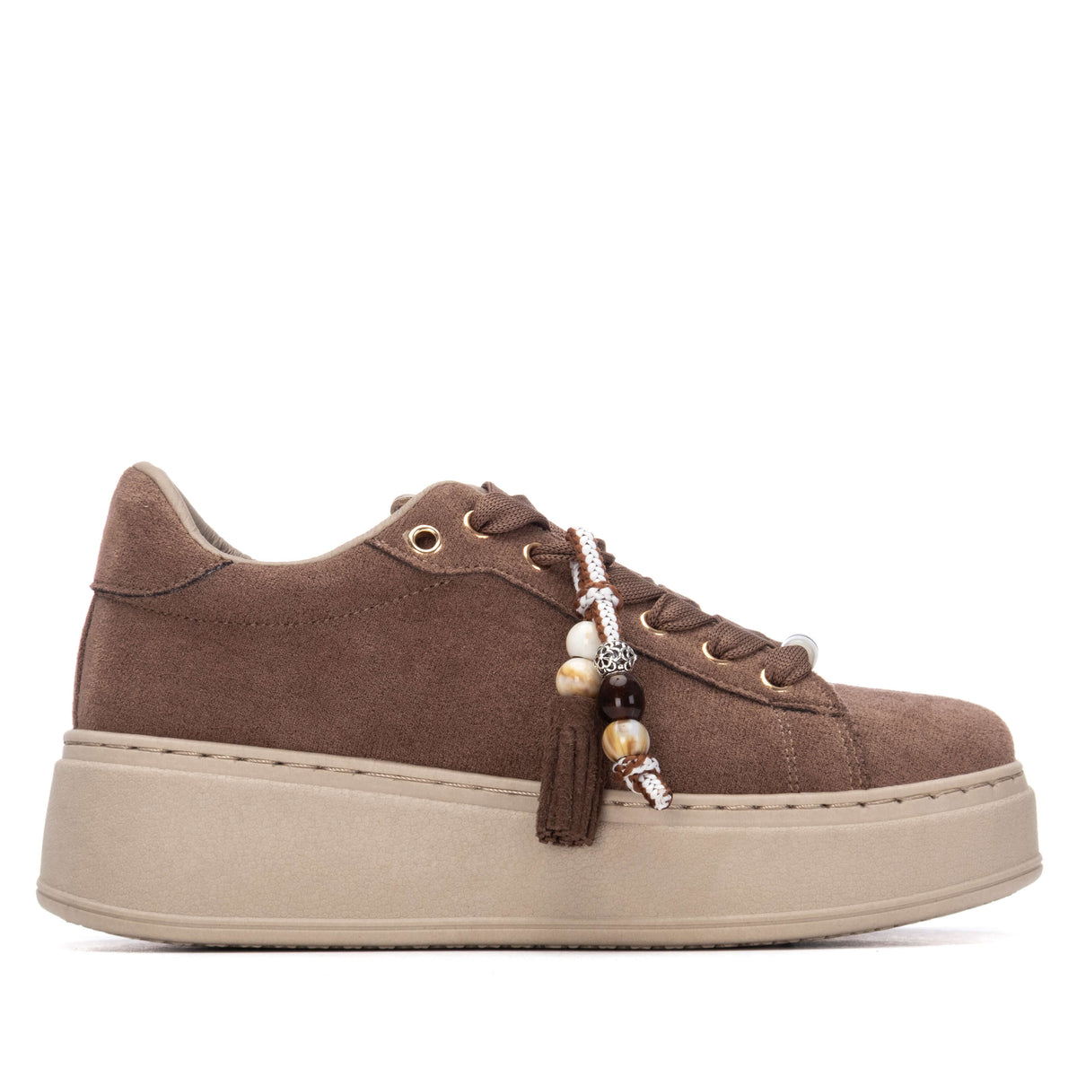 Refresh women’s suede-look runners with tassel and bead details