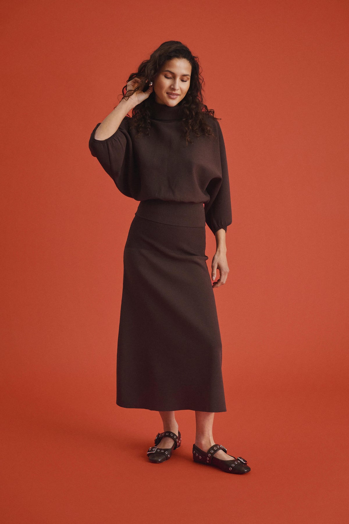 Saint Tropez chocolate brown jumper and skirt on model