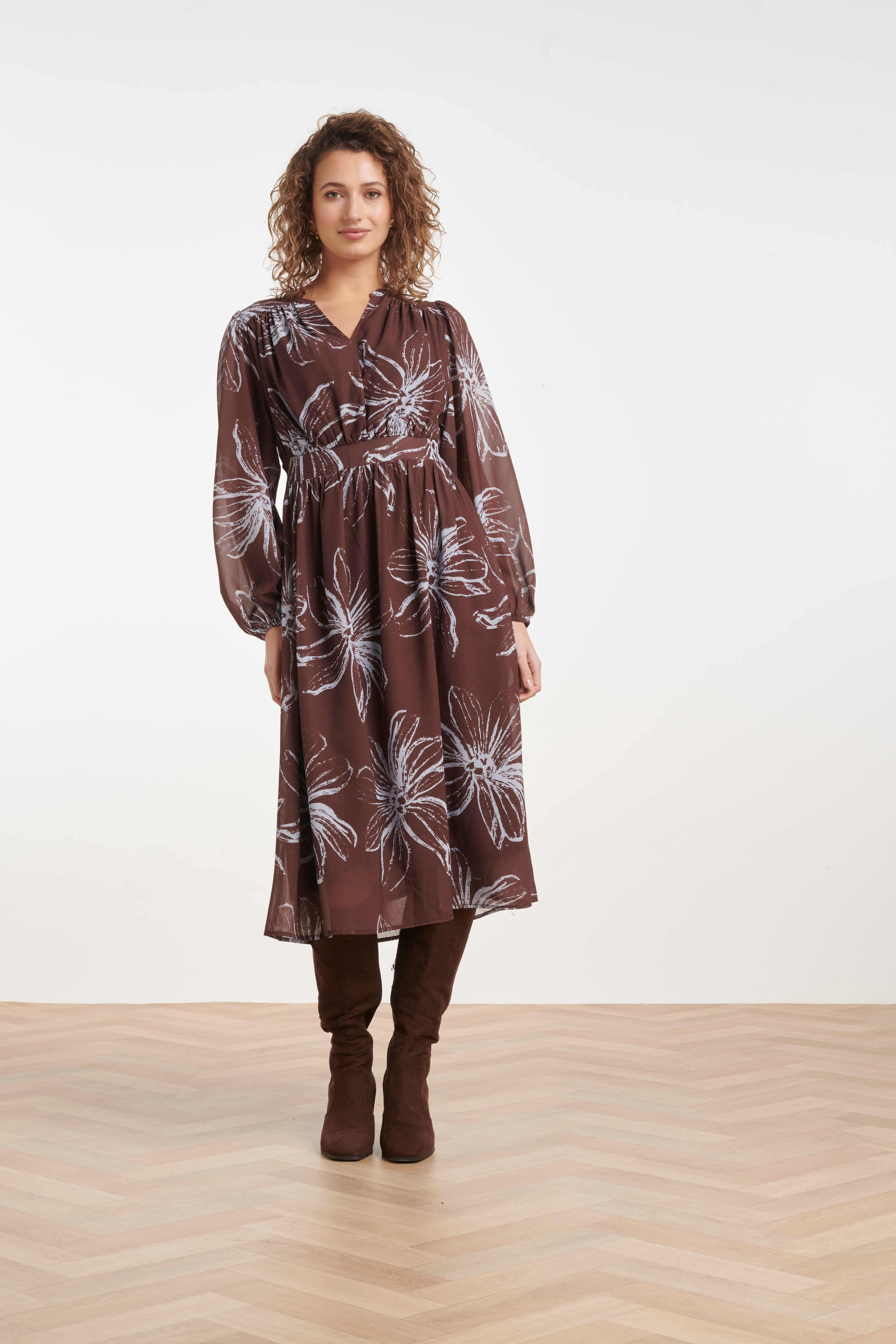 Women’s midi dress with a V-neckline and defined waist