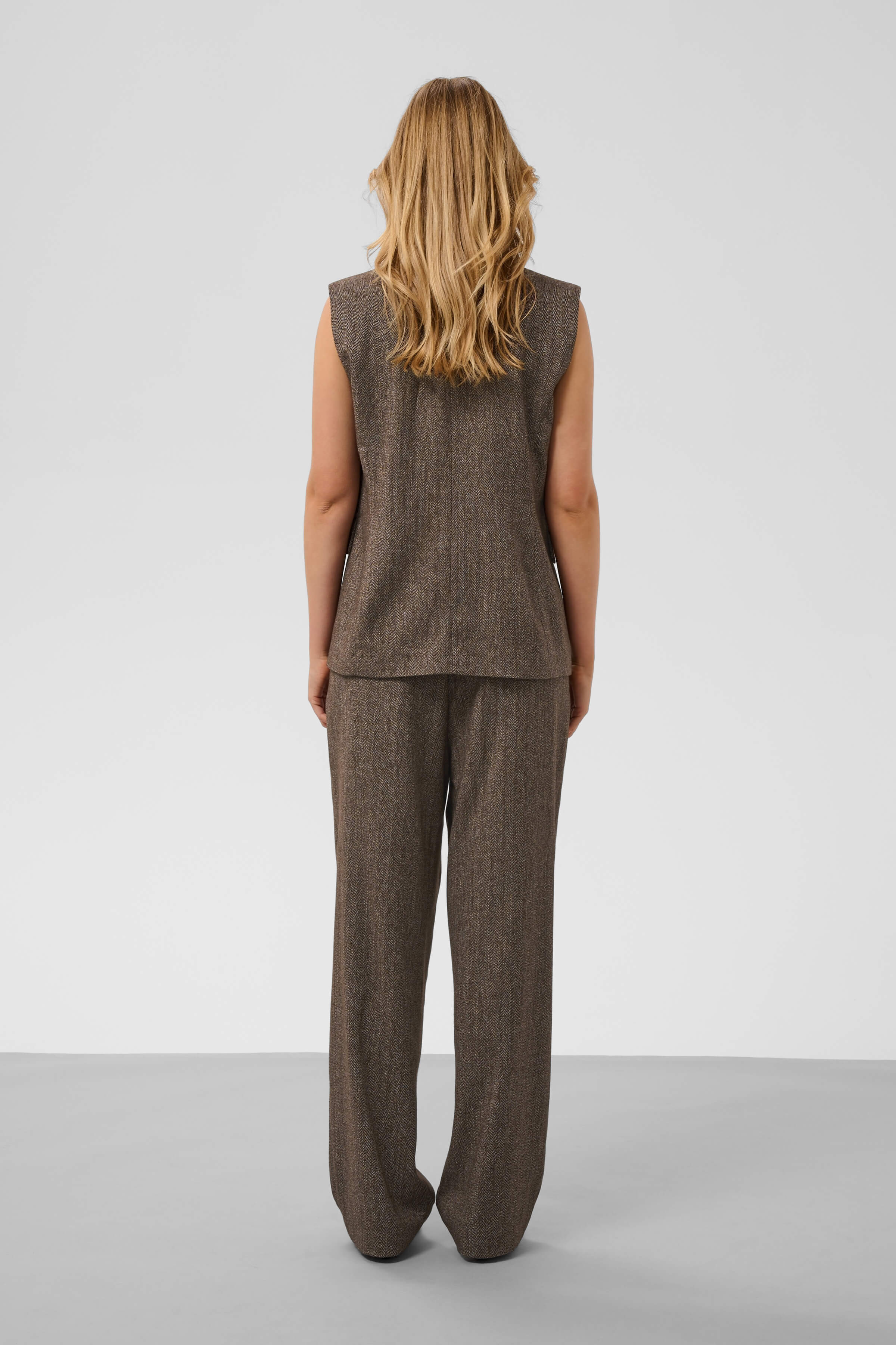 Model wearing the Soaked in Luxury Kango structured waistcoat