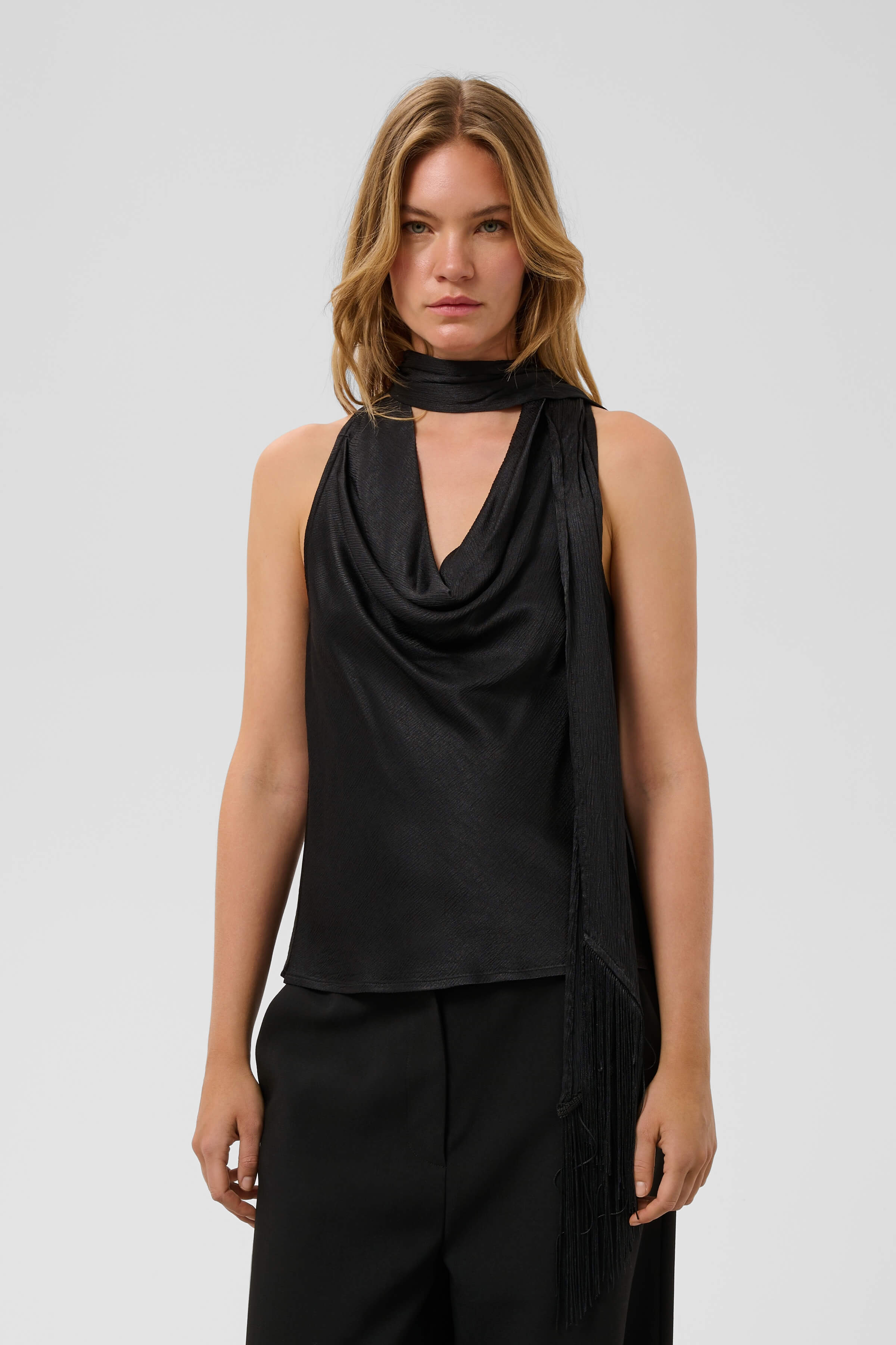odel wearing the Soaked in Luxury Mirabella Aragat draped scarf top