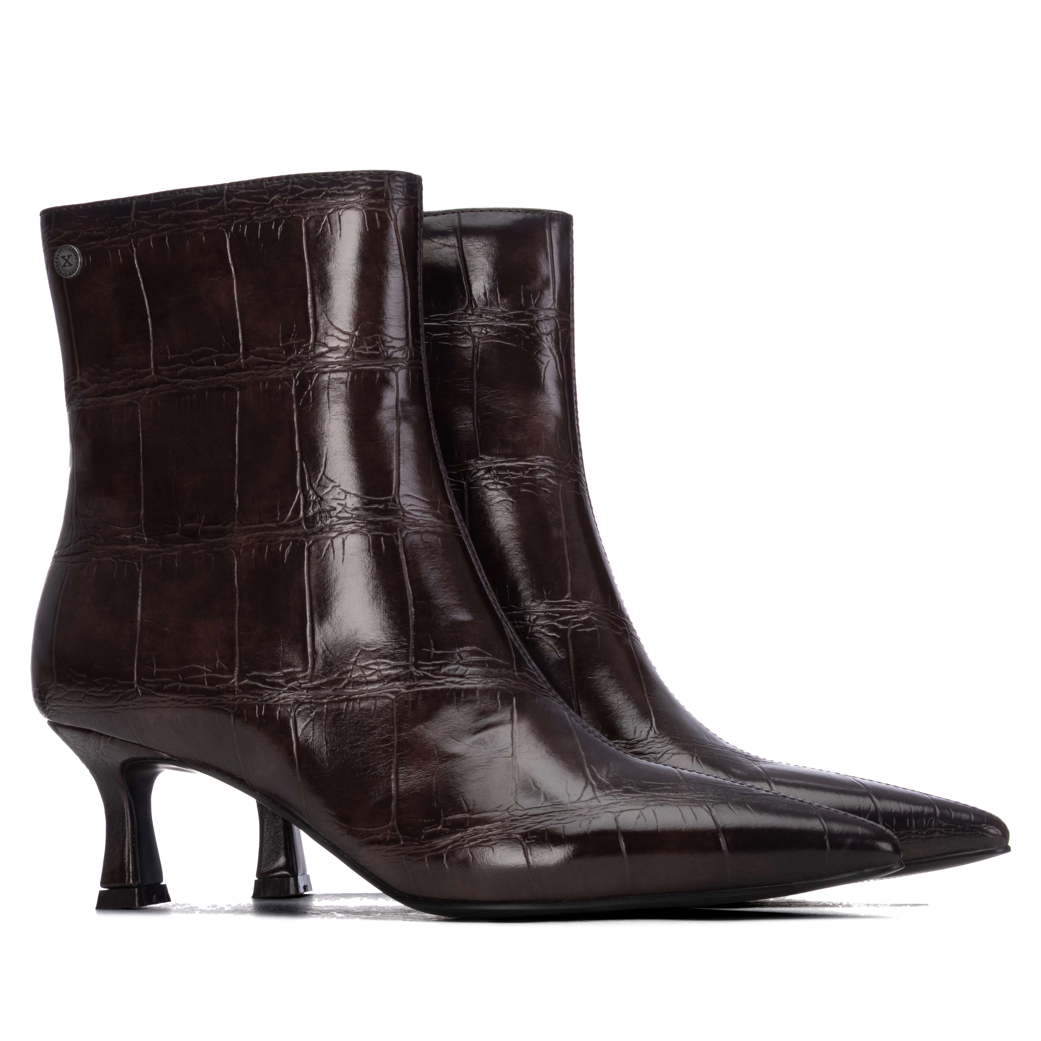A pair of dark brown pointed-toe ankle boots with a glossy crocodile-embossed texture and slim kitten heels.
