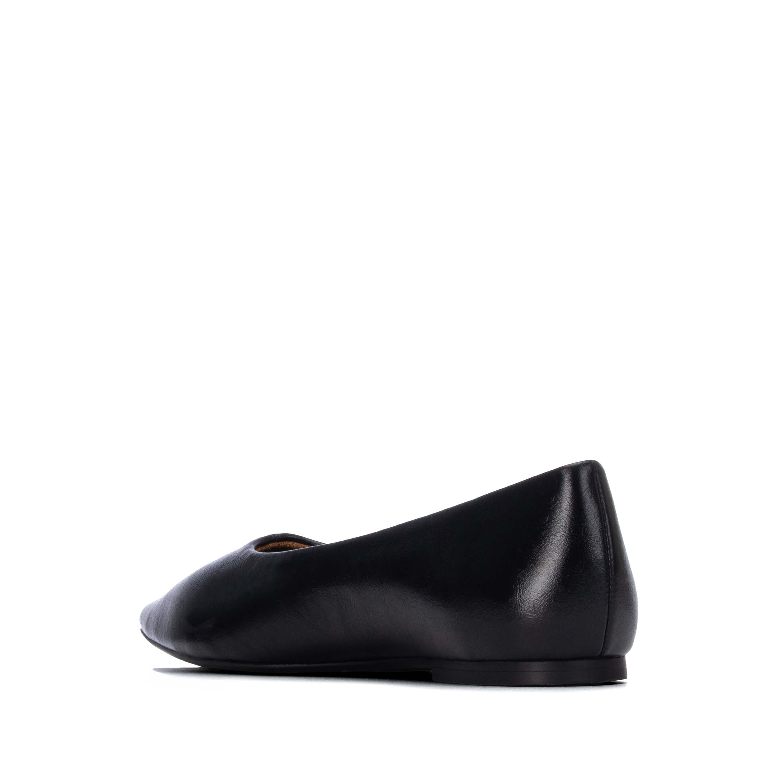 A single black ballet flat from Xti
