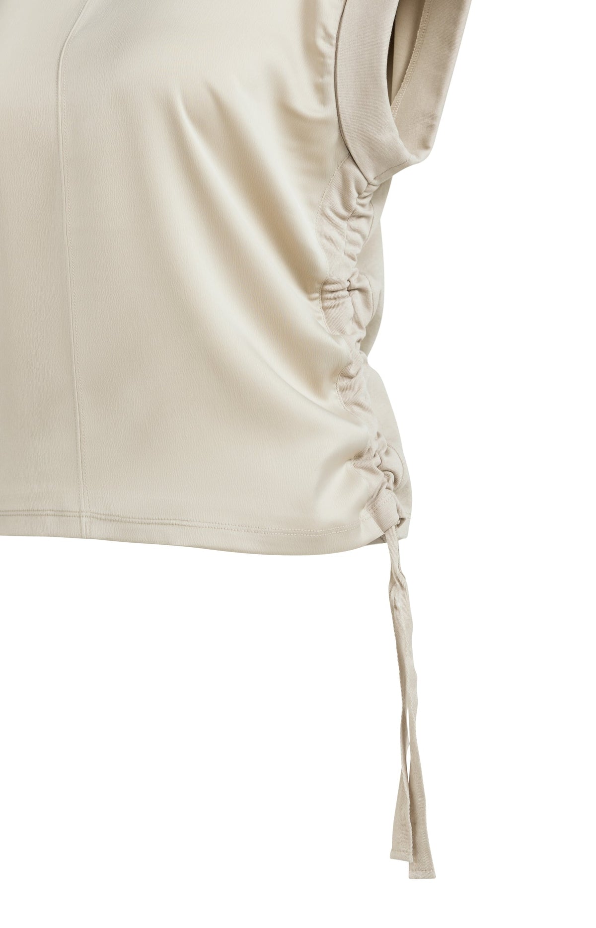 Top with drawstring details and cap sleeves in cream