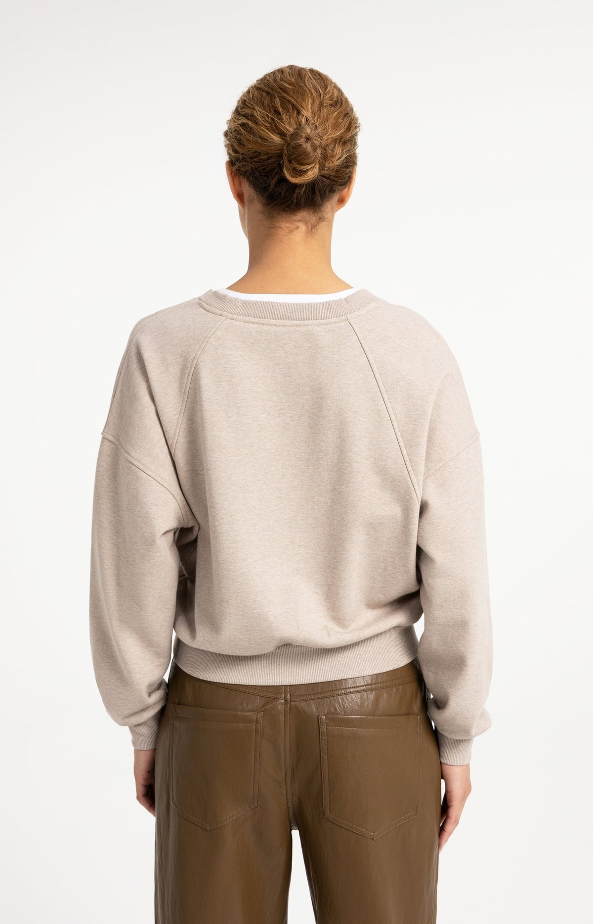 Rear view of the YAYA oversized V-neck sweatshirt