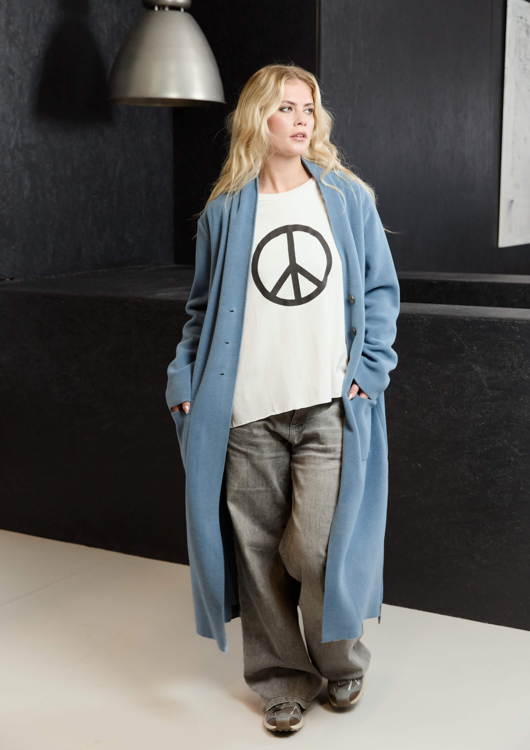 Person wearing a blue coat.