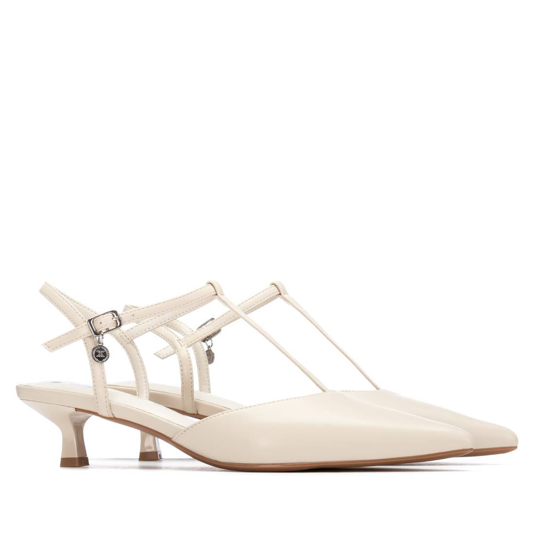 Cream pointy-toe slingback shoes