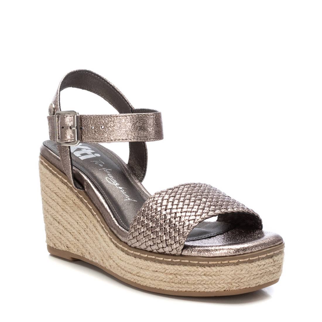 Silver wedge sandal with textured strap 