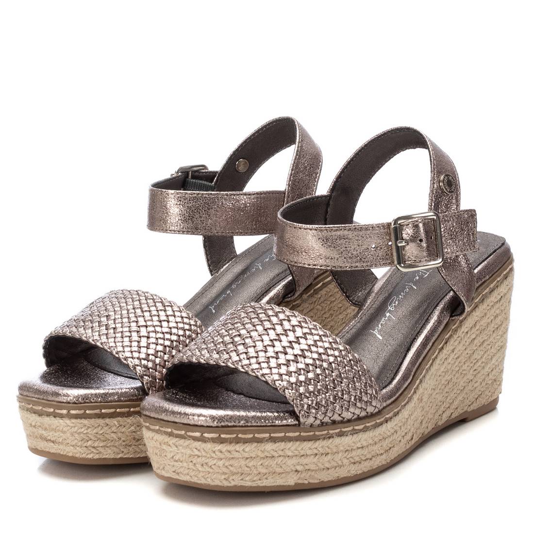 Pair of metallic wedge sandals 