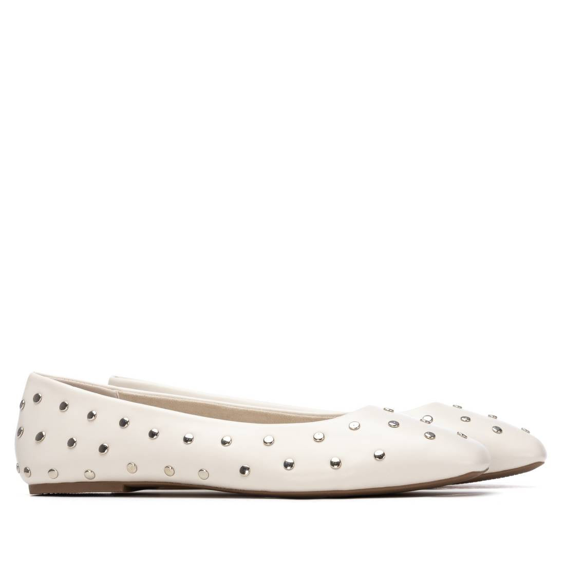 A pair of white studded ballet style flats