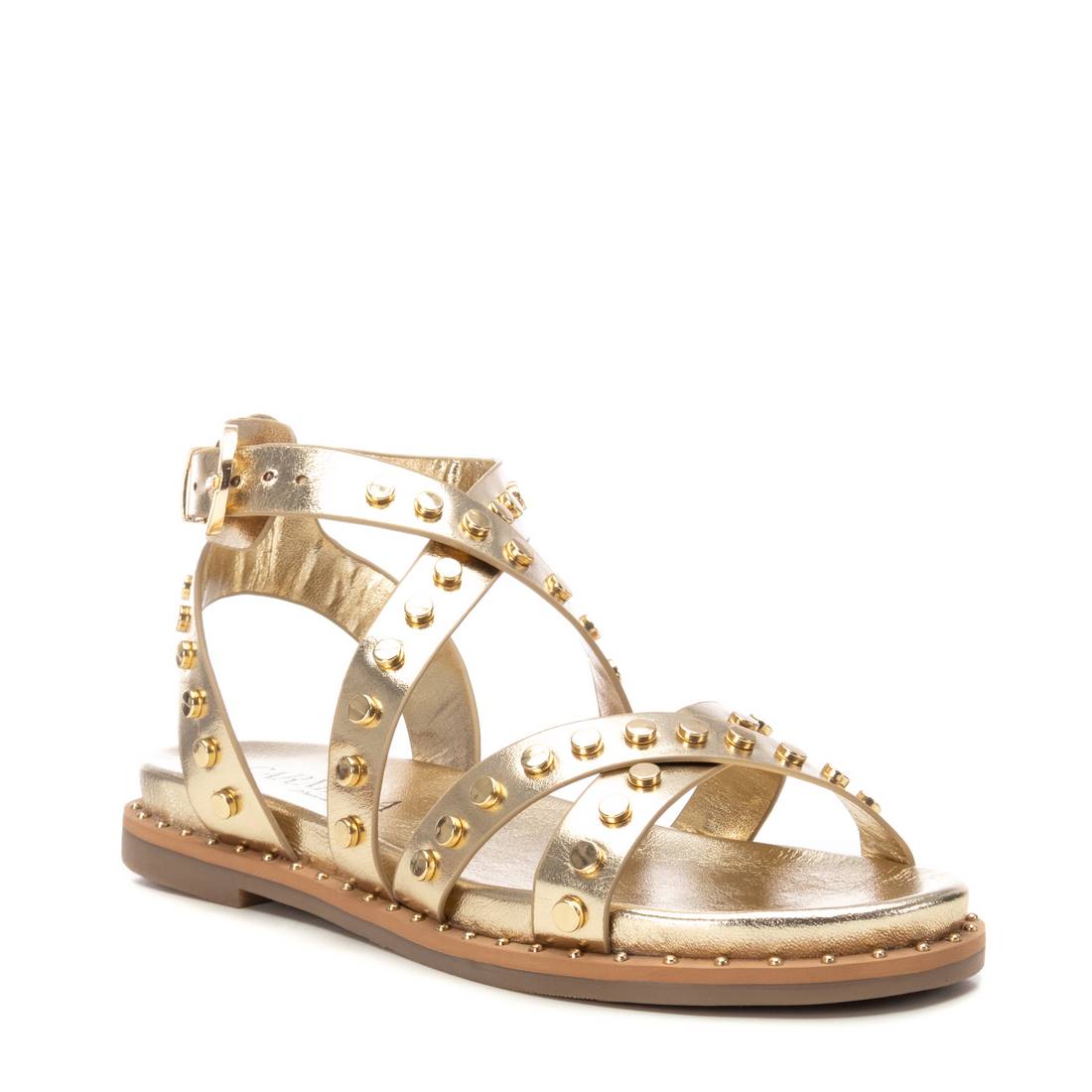 Gold sandal with studded details and ceiss-cross straps