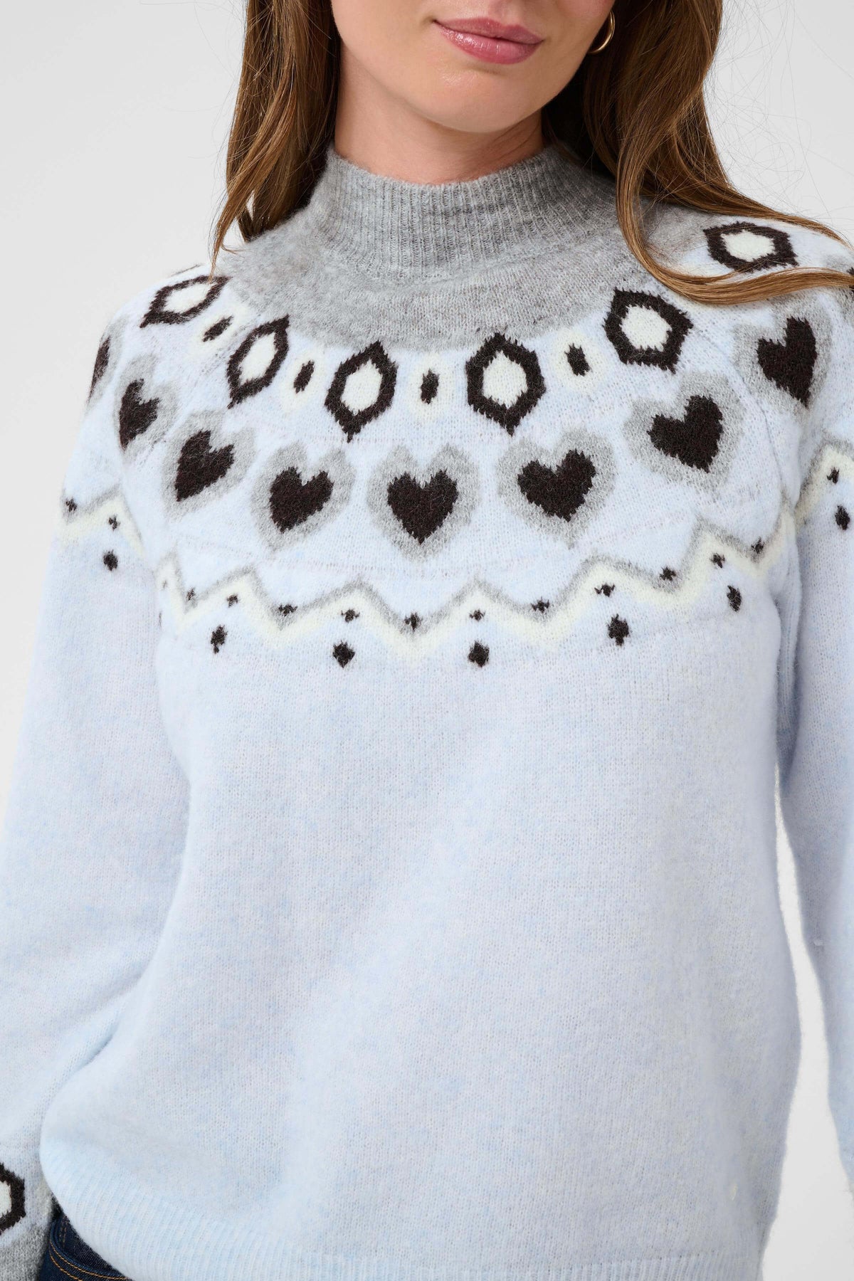Cream Cherrie geometric heart motif detail