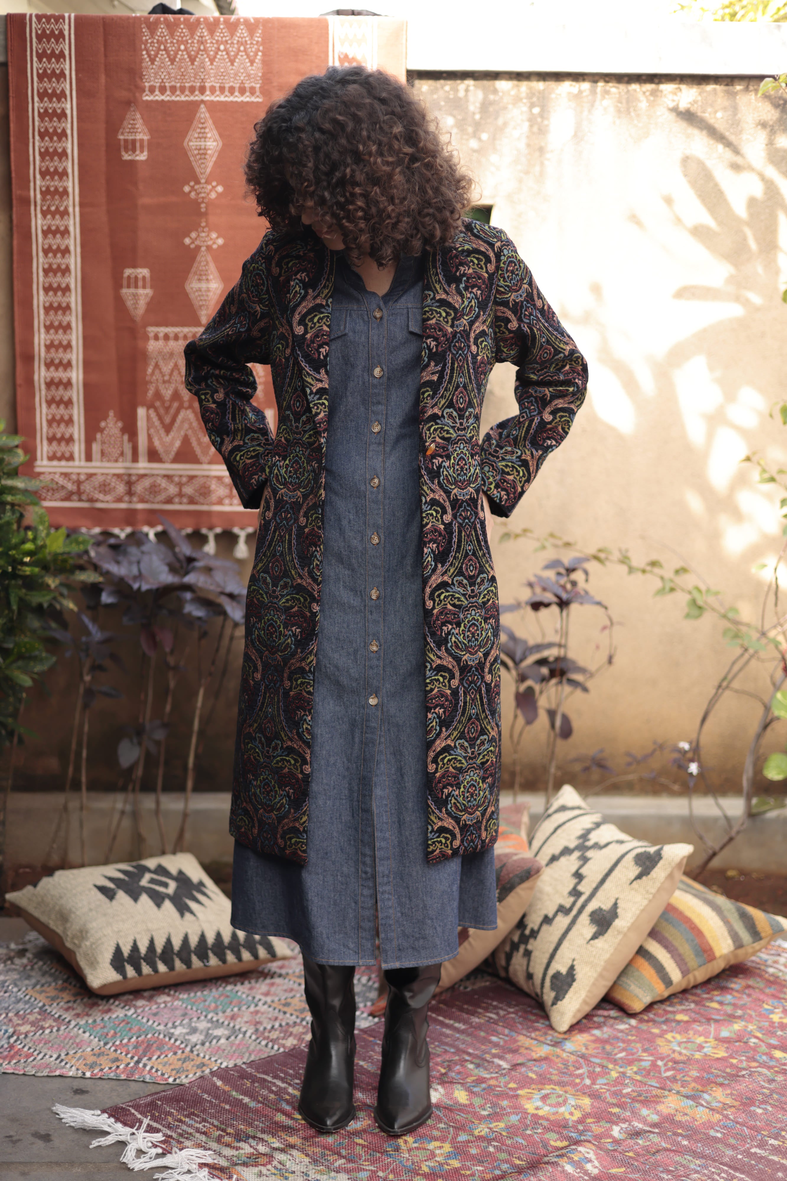Model wearing the Emily Lovelock Deborah patterned longline coat open