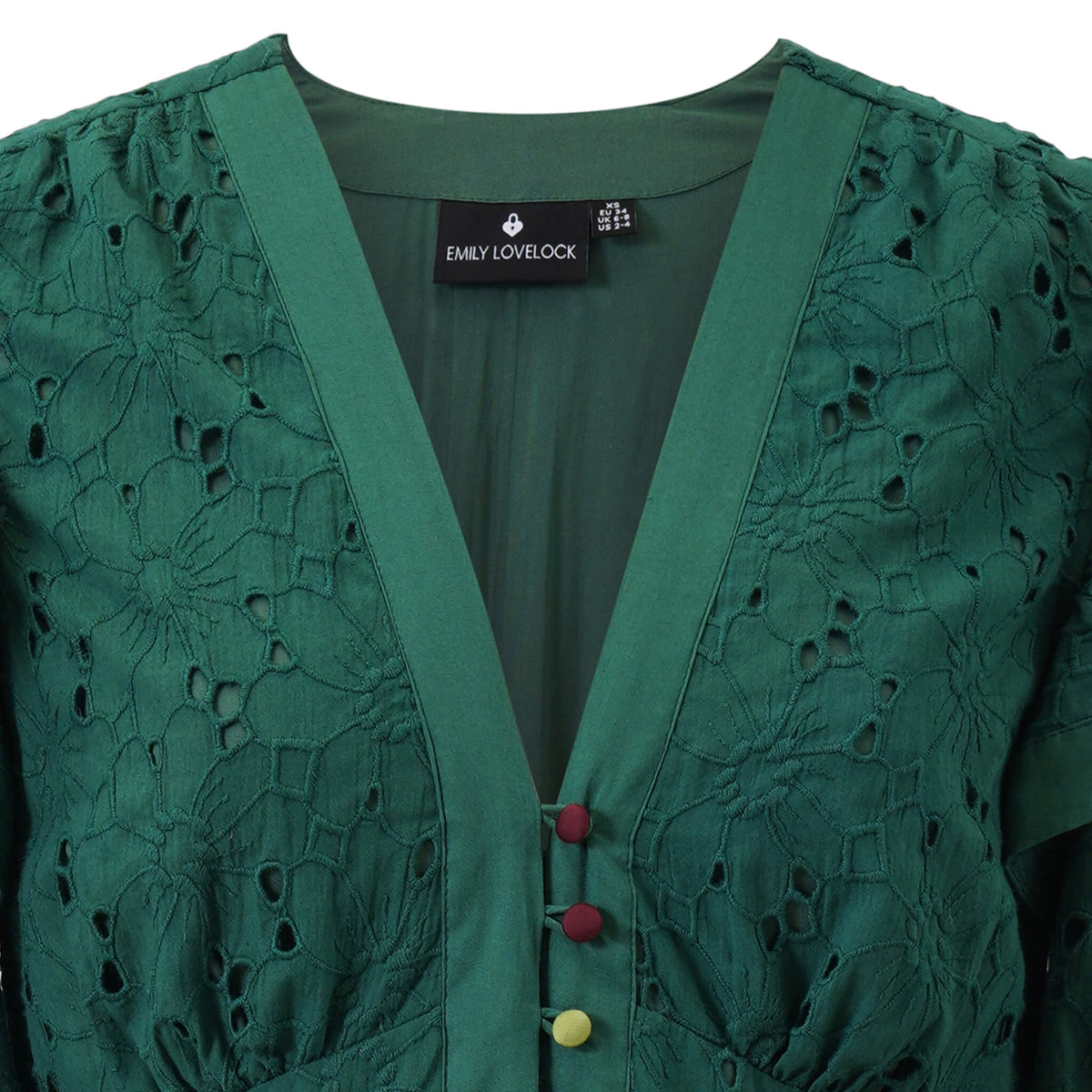 Emily Lovelock floral broderie dress with deep V-neckline