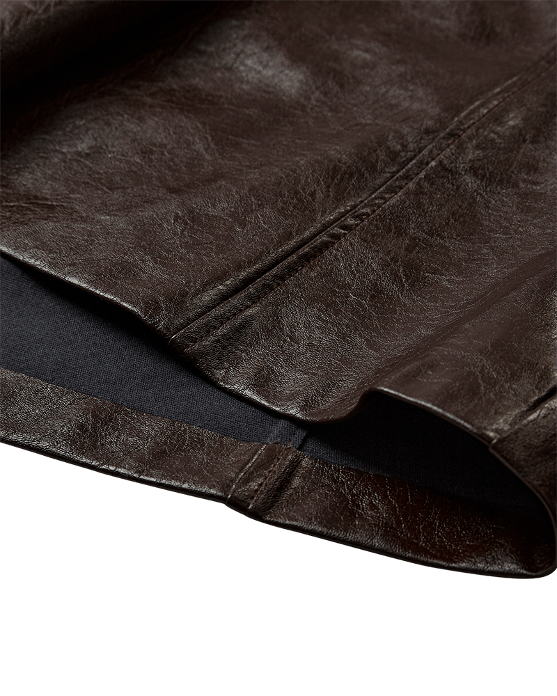 Brown A-line faux leather skirt with waist belt