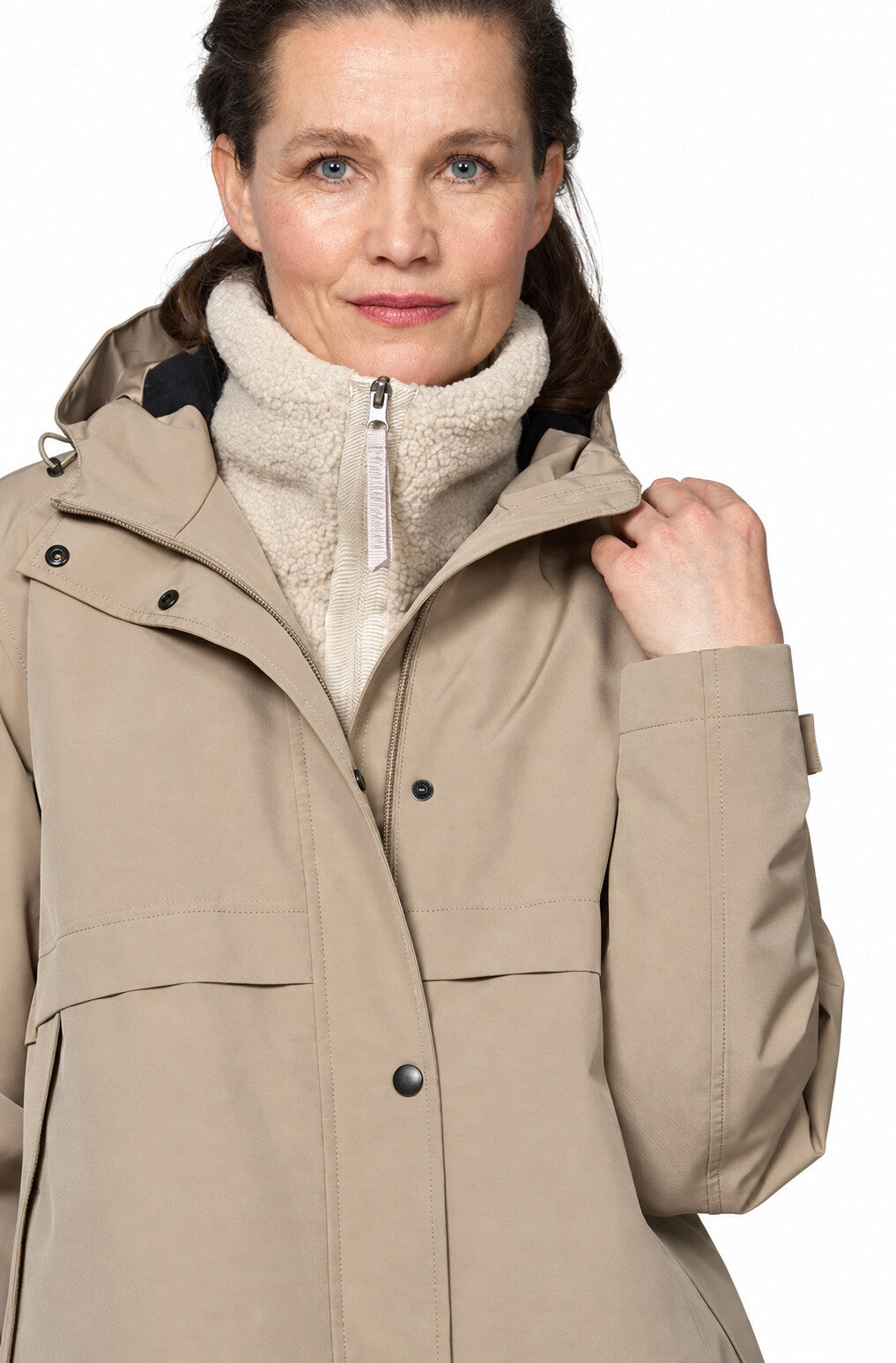 Close-up of ILSE JACOBSEN DashRain02 raincoat showing the hood, collar and front fastening
