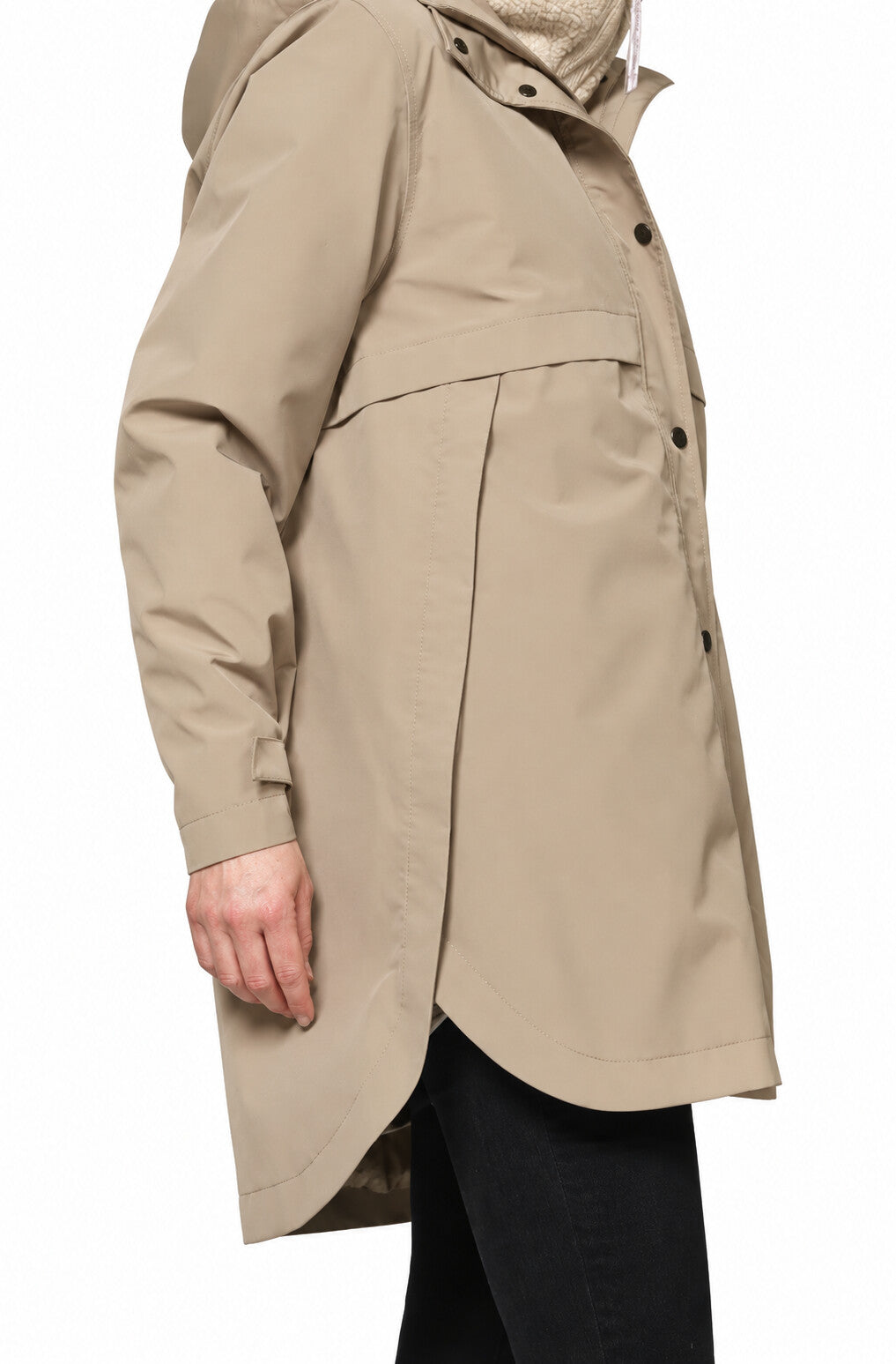 Close-up of ILSE JACOBSEN DashRain02 raincoat showing the concealed zipped pocket and adjustable sleeve cuff