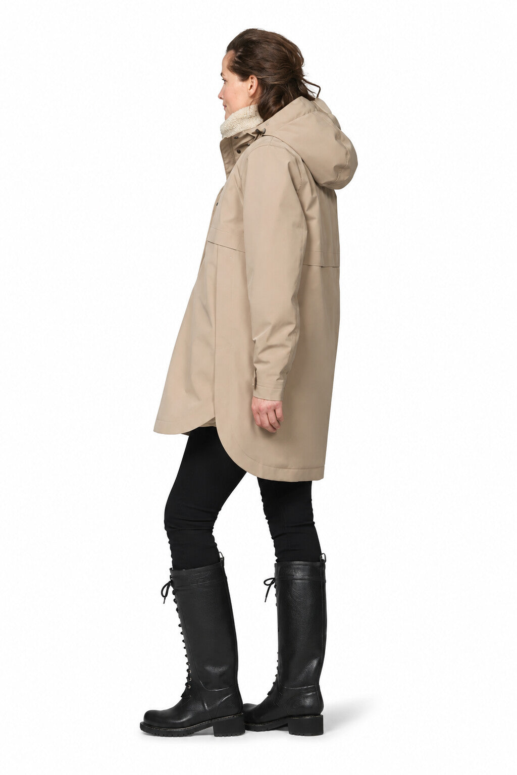 Side view of ILSE JACOBSEN DashRain02 raincoat showing the fixed hood and longer curved back hem