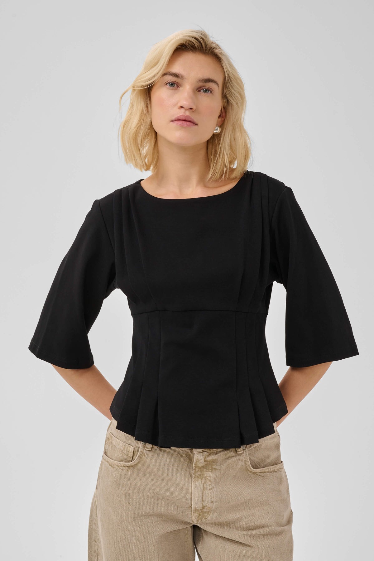 MWApir women’s top with wide round neckline and elbow-length sleeves
