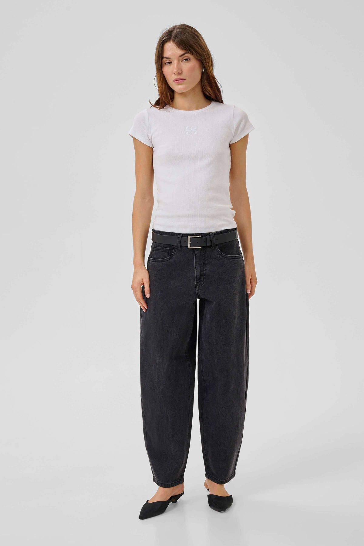 BalooMW high-rise tapered jeans styled on a model