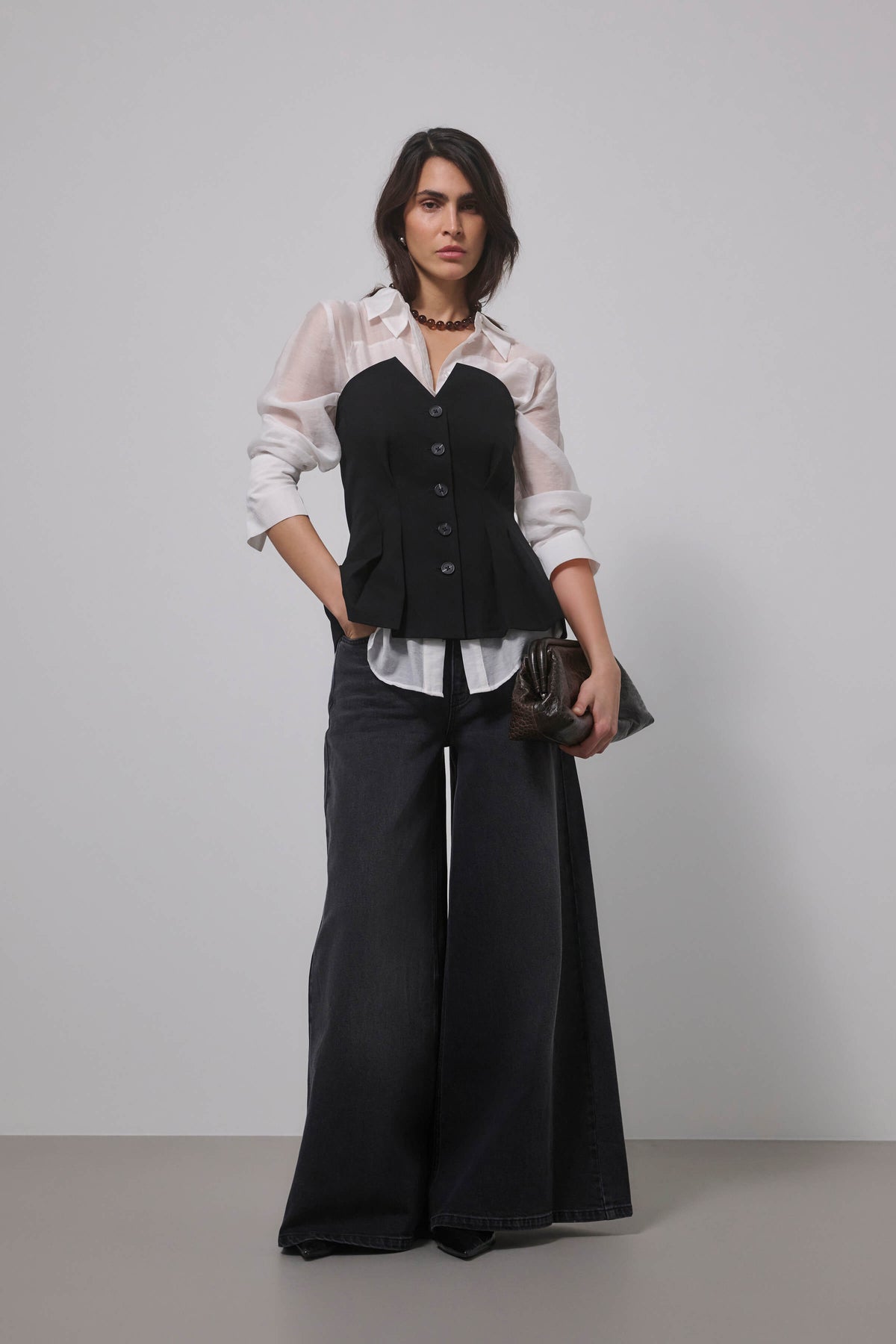 My Essential Wardrobe Evelina peplum top styled with wide-leg trousers