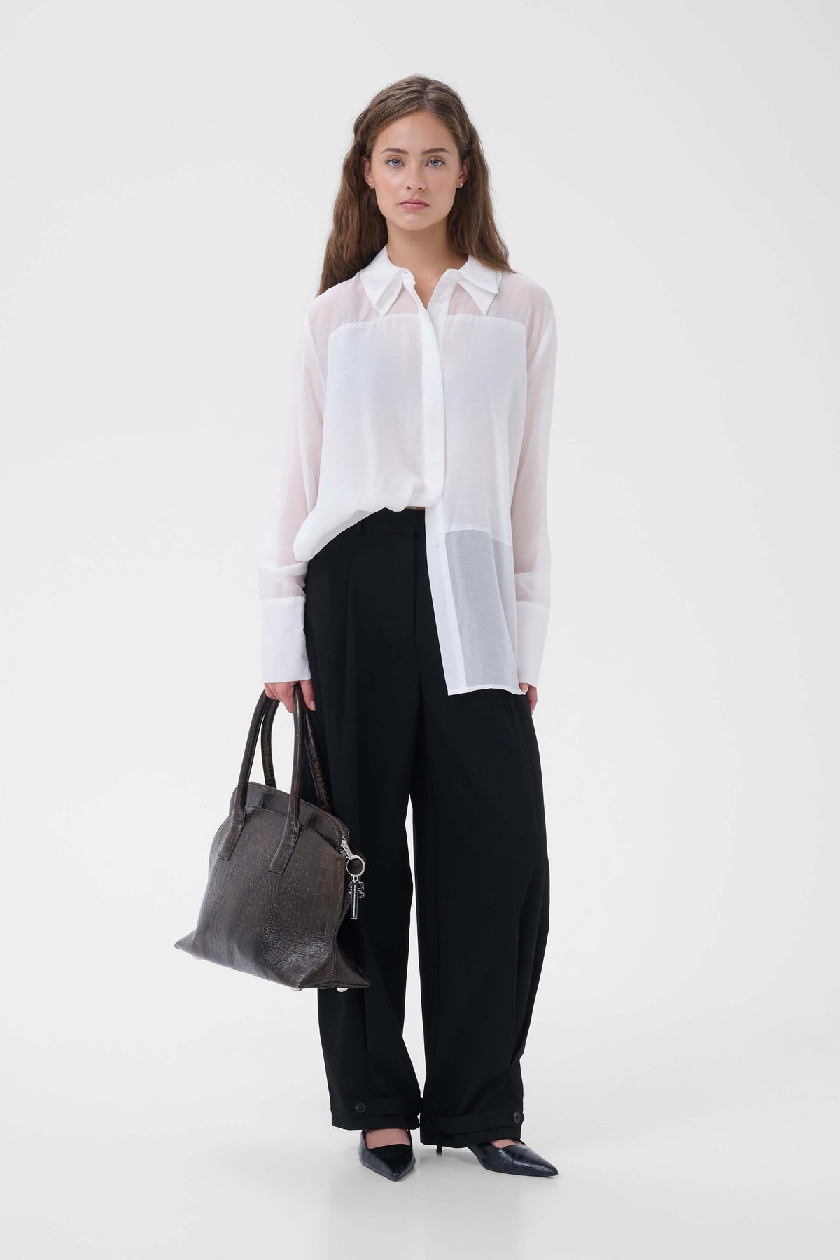 My Essential Wardrobe Smilla longline shirt styled with black trousers