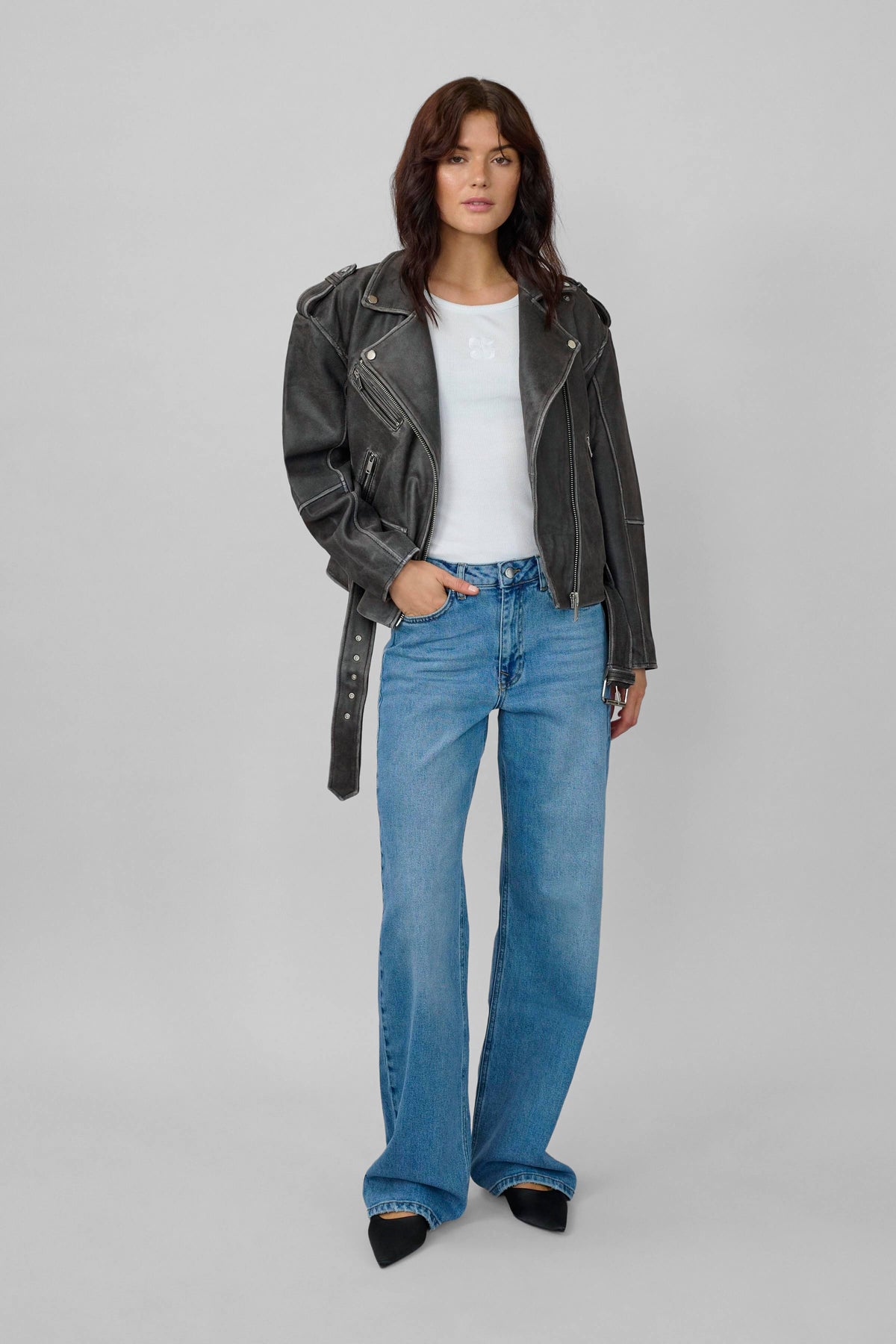 Front view of the Gilo leather jacket with asymmetric zip fastening