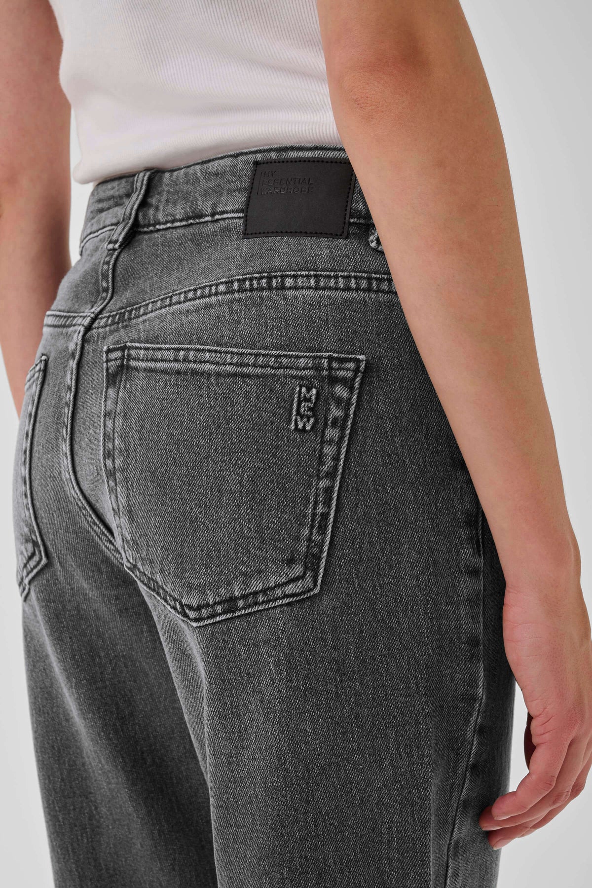 Close-up of The Mommy Jeans’ high waist and five-pocket design