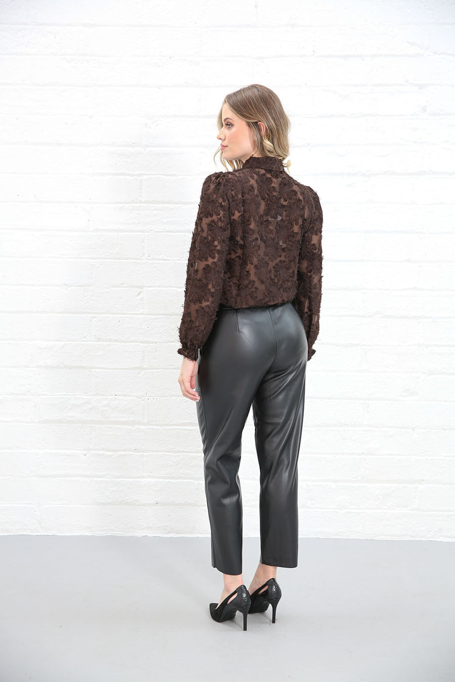 Rant & Rave textured floral blouse styled with trousers