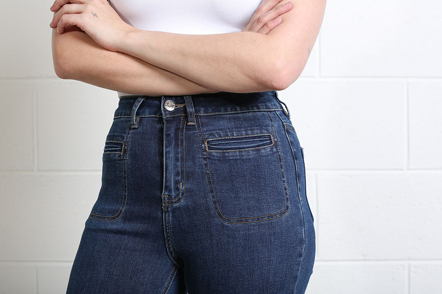 Close-up of the Ada Jeans with zip pockets and contrast stitching
