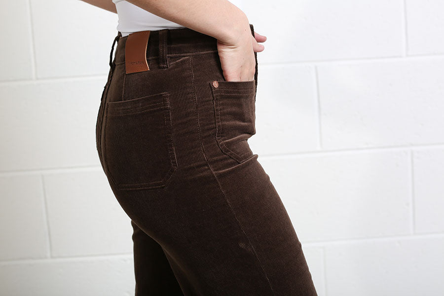 Women’s high-rise corduroy trousers with front patch pockets