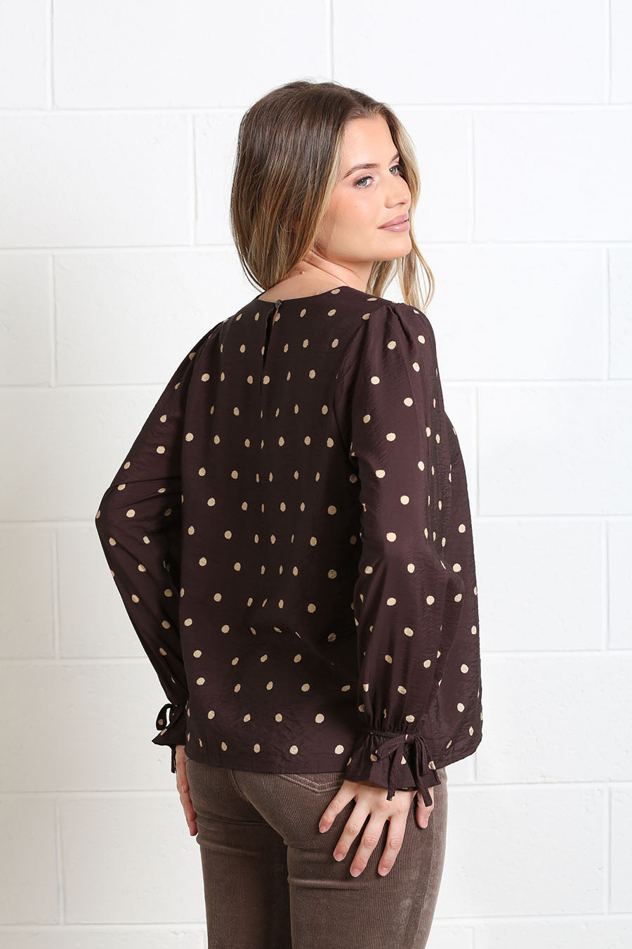 Sophia relaxed-fit blouse featuring a classic polka-dot pattern