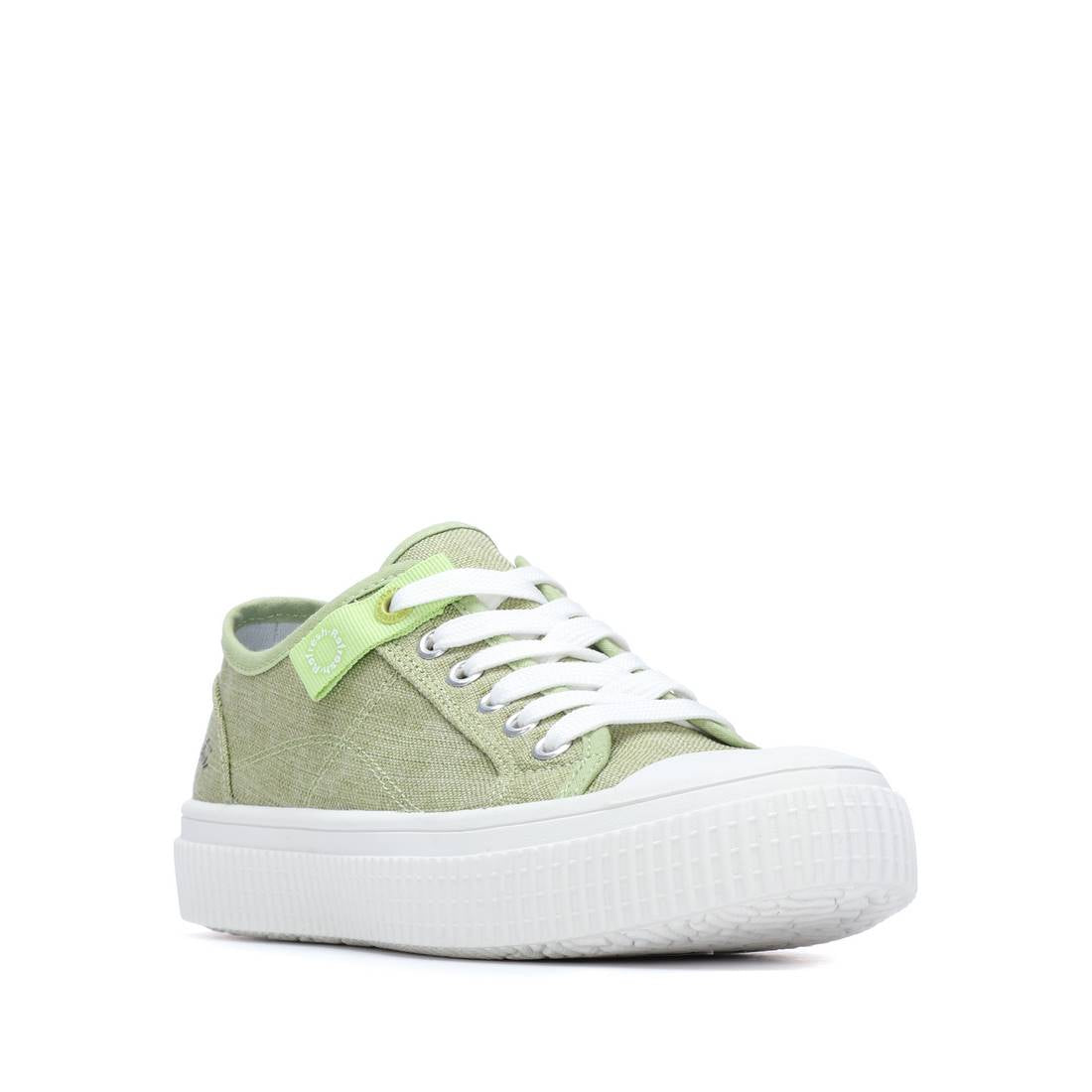 Green sneaker with white laces 