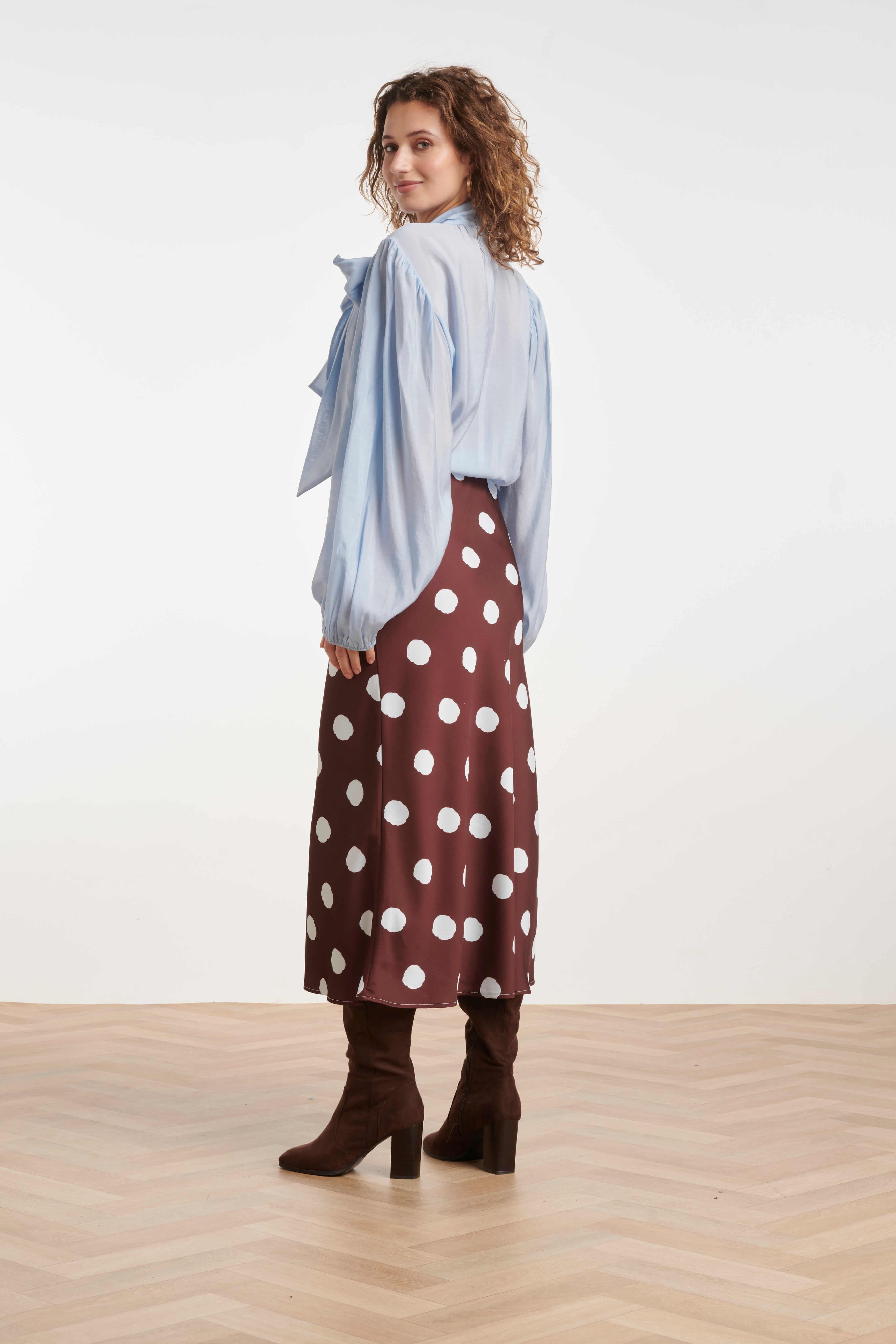 Side view of the Smashed Lemon softly flared midi skirt