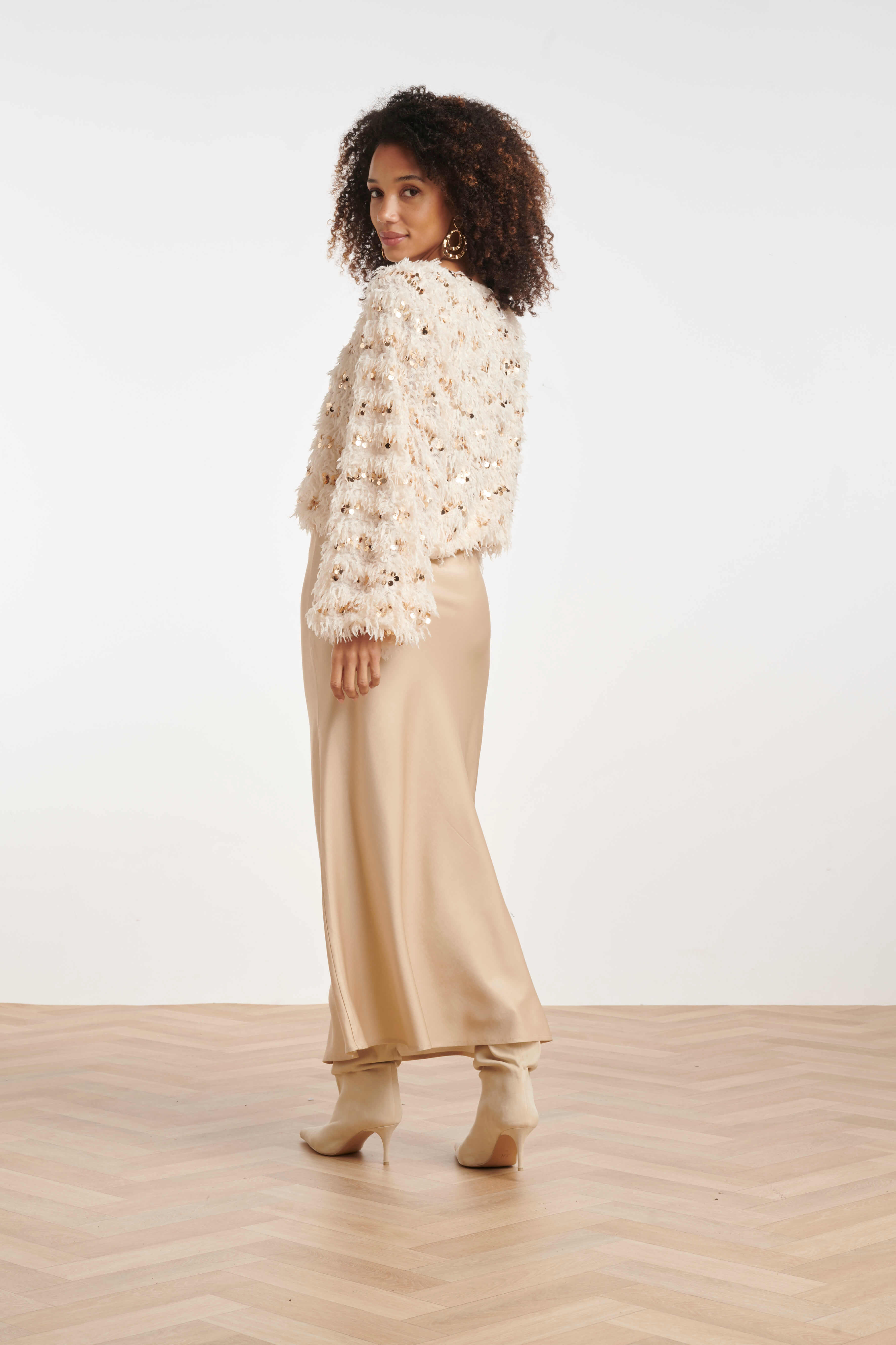 Side view of the Smashed Lemon textured sequin top